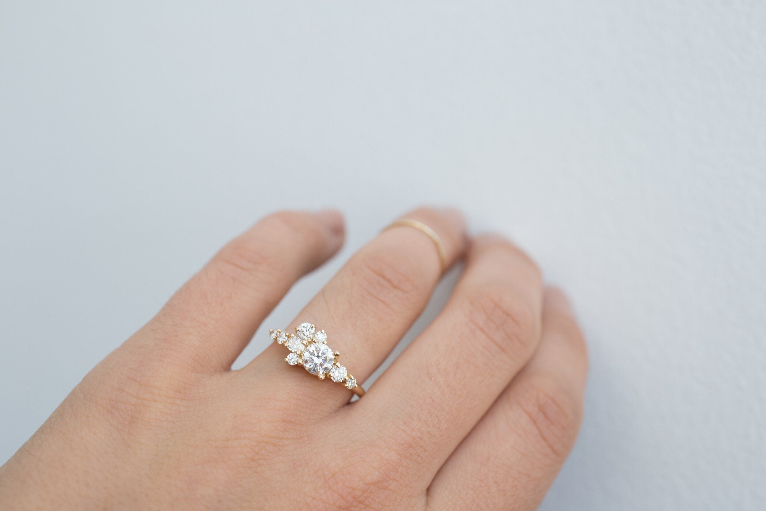 Ilia Ring | Round Brilliant Cut Diamond + Diamond Cluster Engagement Ring 0.70 ct | 14k Recycled Gold