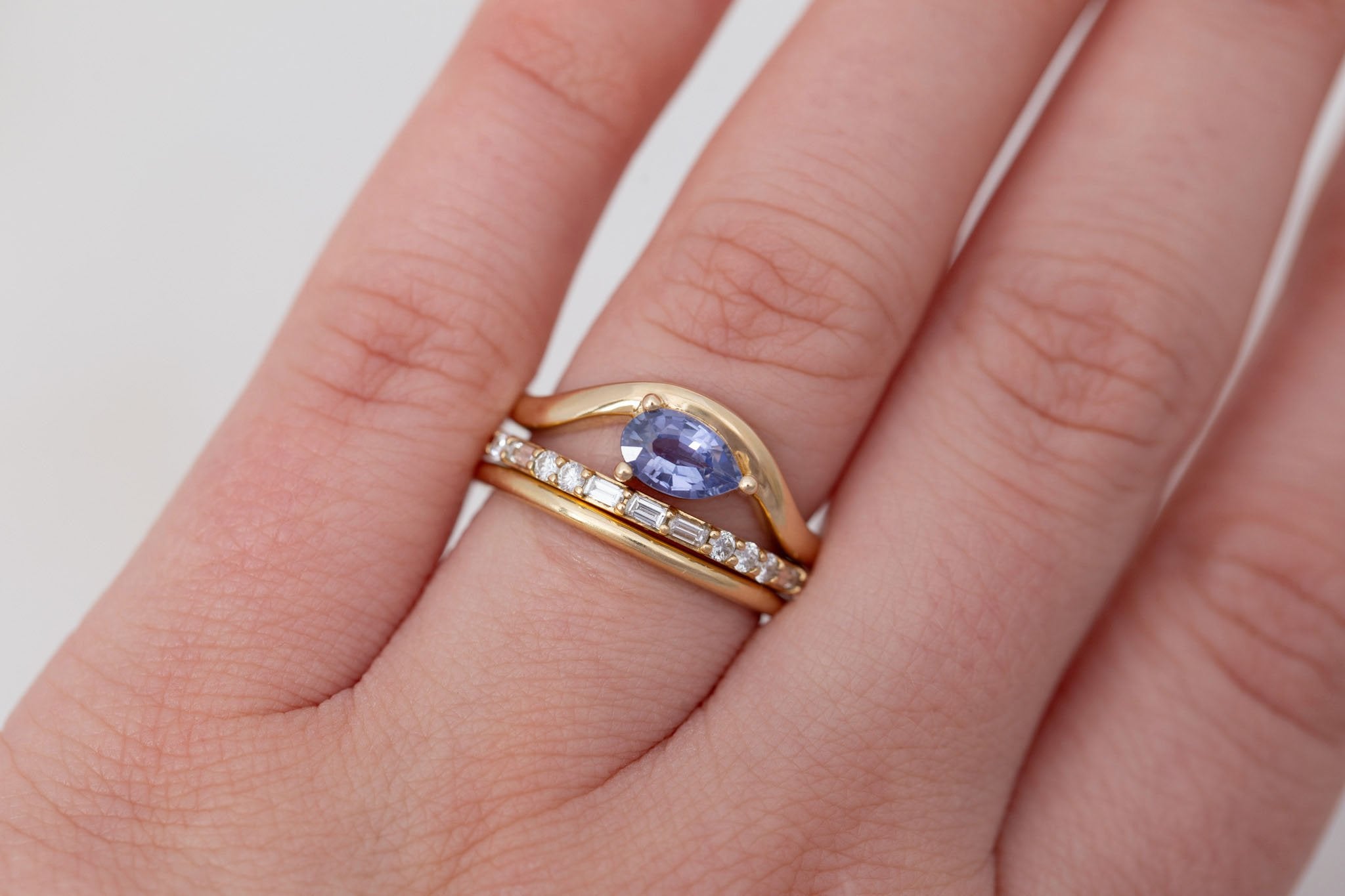 Rhodes Ring | Periwinkle Pear Sapphire Solitaire + Curved Band Engagement Ring 0.81 ct | 14k Recycled Gold | One of a Kind