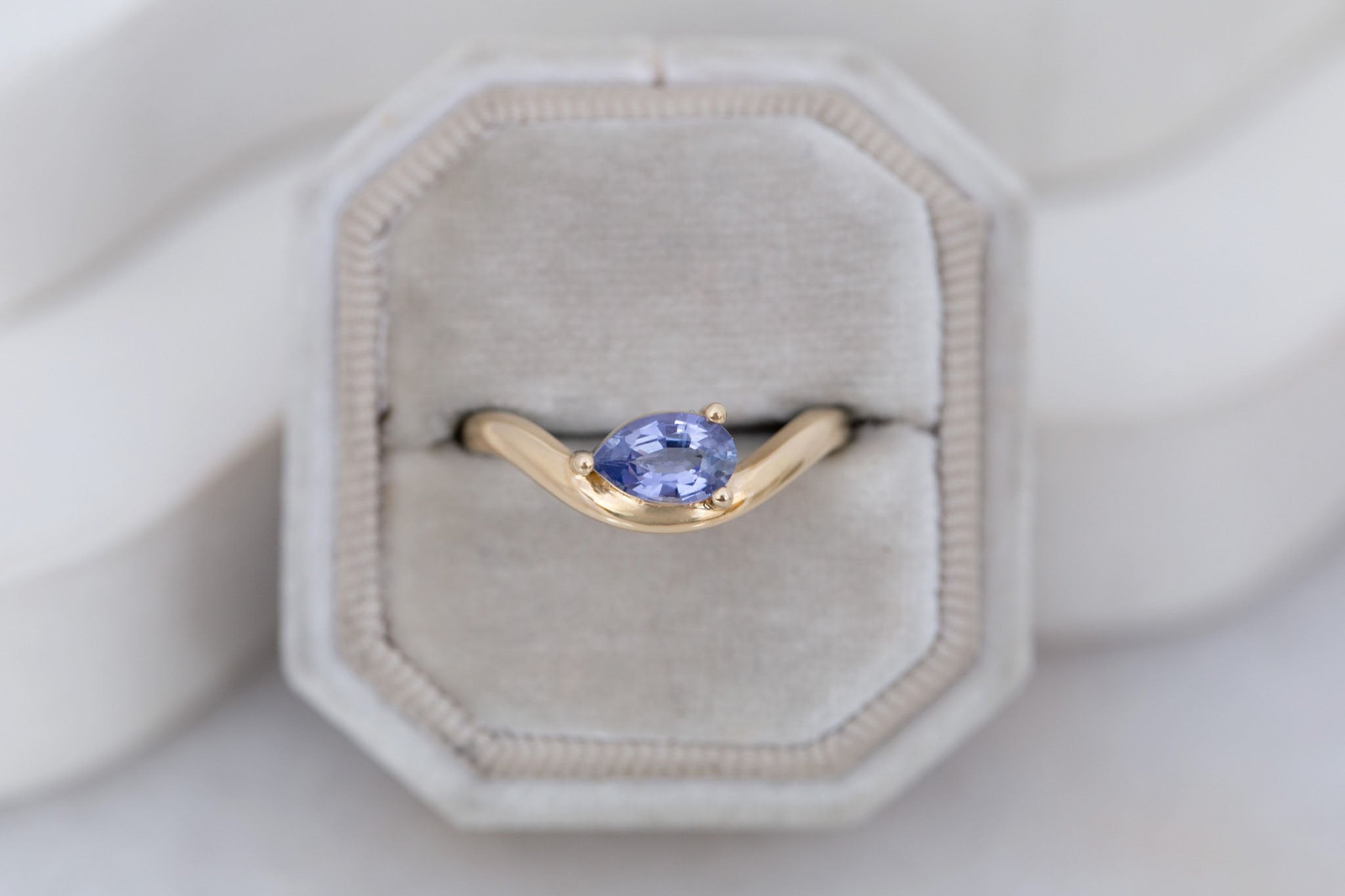 Rhodes Ring | Periwinkle Pear Sapphire Solitaire + Curved Band Engagement Ring 0.81 ct | 14k Recycled Gold | One of a Kind