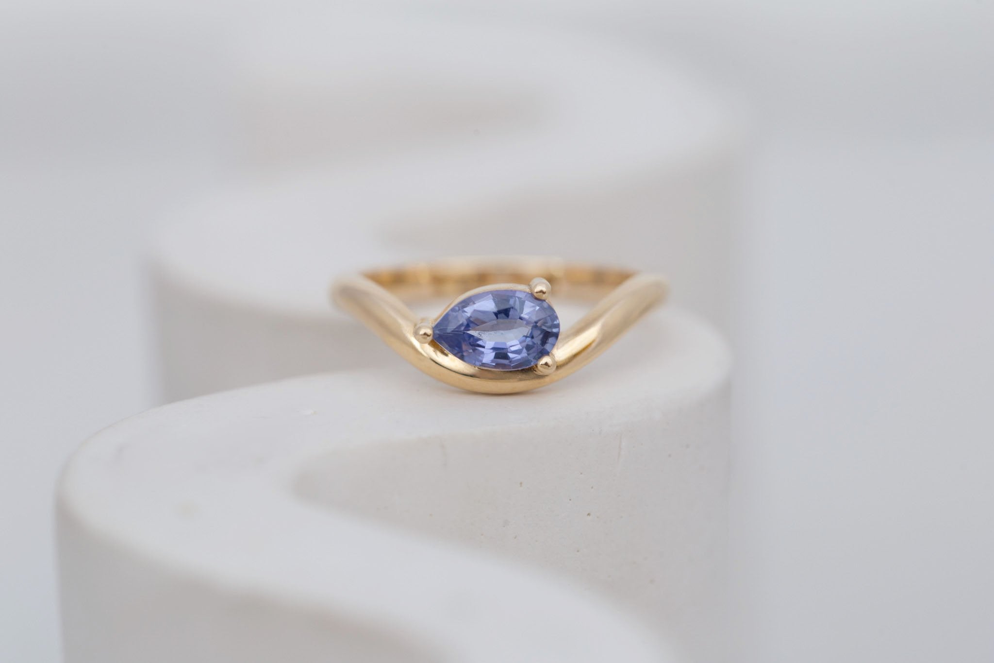 Rhodes Ring | Periwinkle Pear Sapphire Solitaire + Curved Band Engagement Ring 0.81 ct | 14k Recycled Gold | One of a Kind
