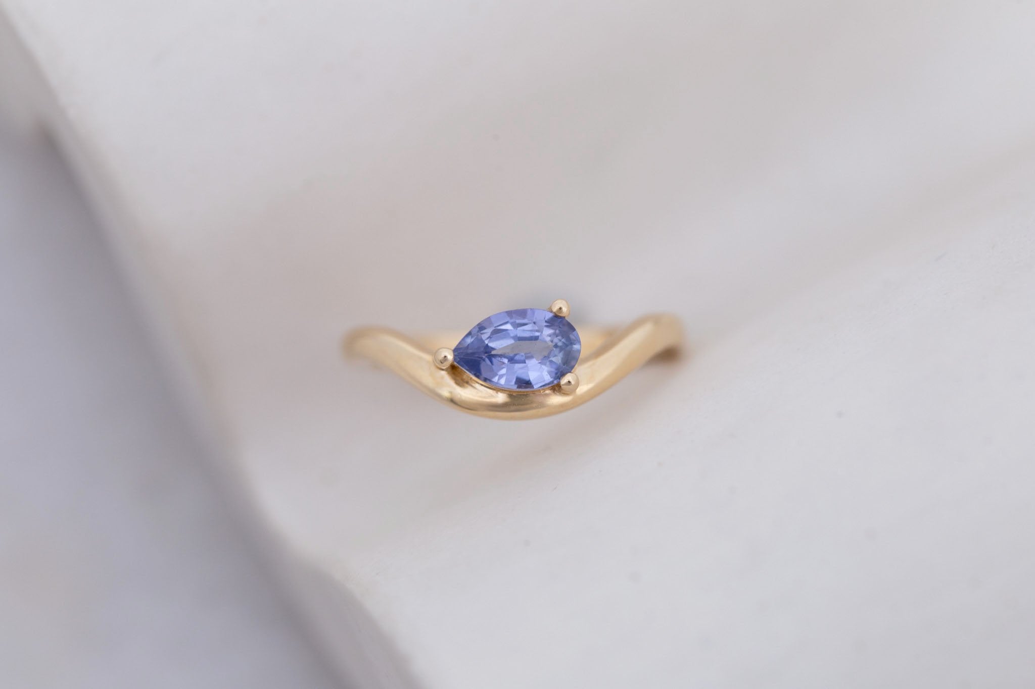Rhodes Ring | Periwinkle Pear Sapphire Solitaire + Curved Band Engagement Ring 0.81 ct | 14k Recycled Gold | One of a Kind