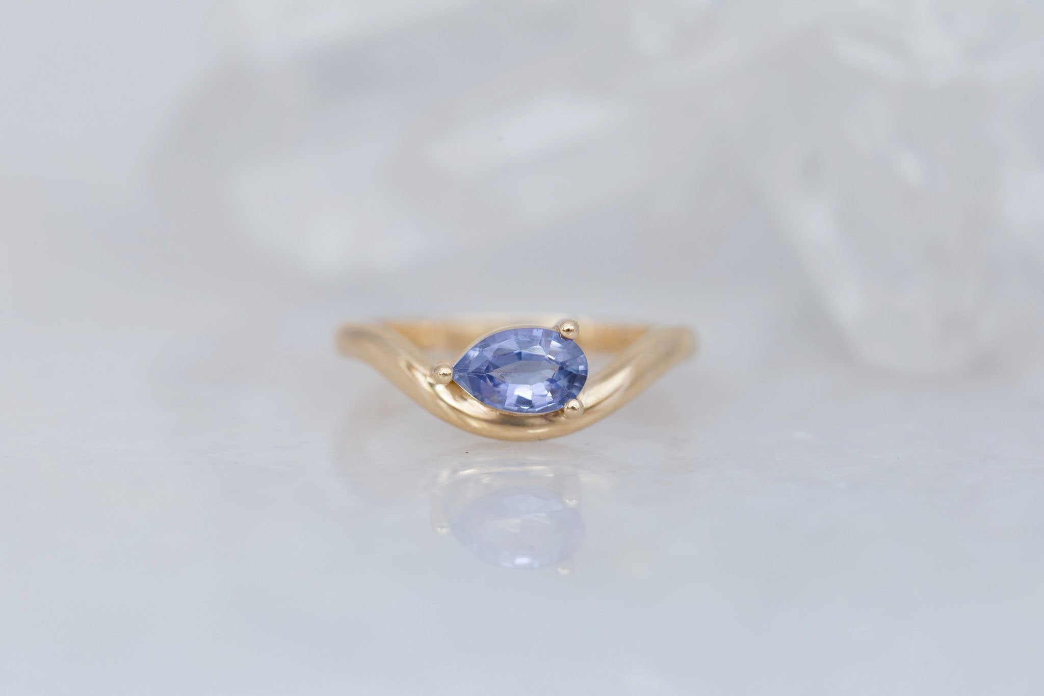 Rhodes Ring | Periwinkle Pear Sapphire Solitaire + Curved Band Engagement Ring 0.81 ct | 14k Recycled Gold | One of a Kind