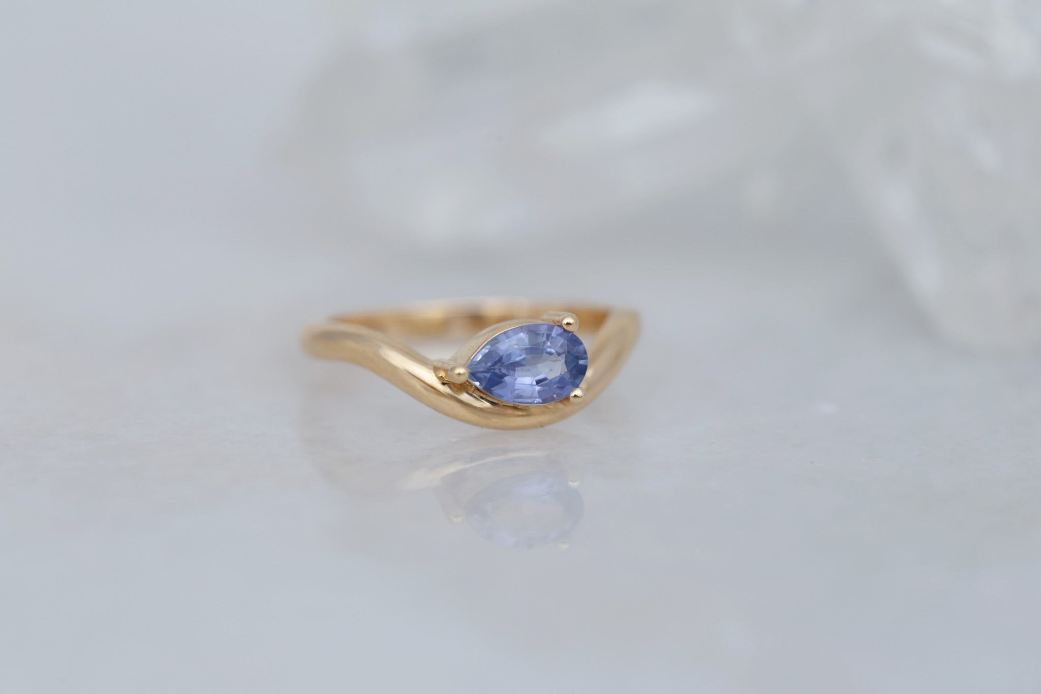 Rhodes Ring | Periwinkle Pear Sapphire Solitaire + Curved Band Engagement Ring 0.81 ct | 14k Recycled Gold | One of a Kind