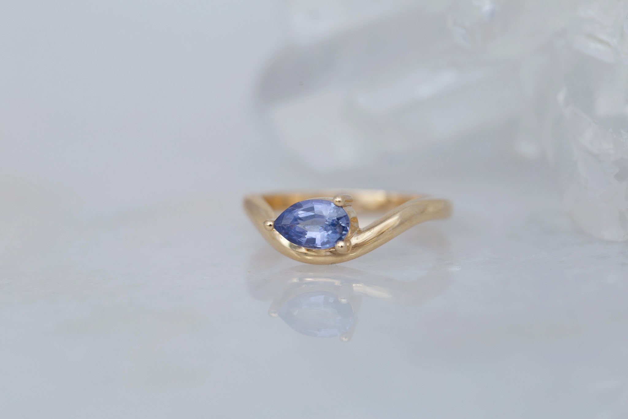 Rhodes Ring | Periwinkle Pear Sapphire Solitaire + Curved Band Engagement Ring 0.81 ct | 14k Recycled Gold | One of a Kind