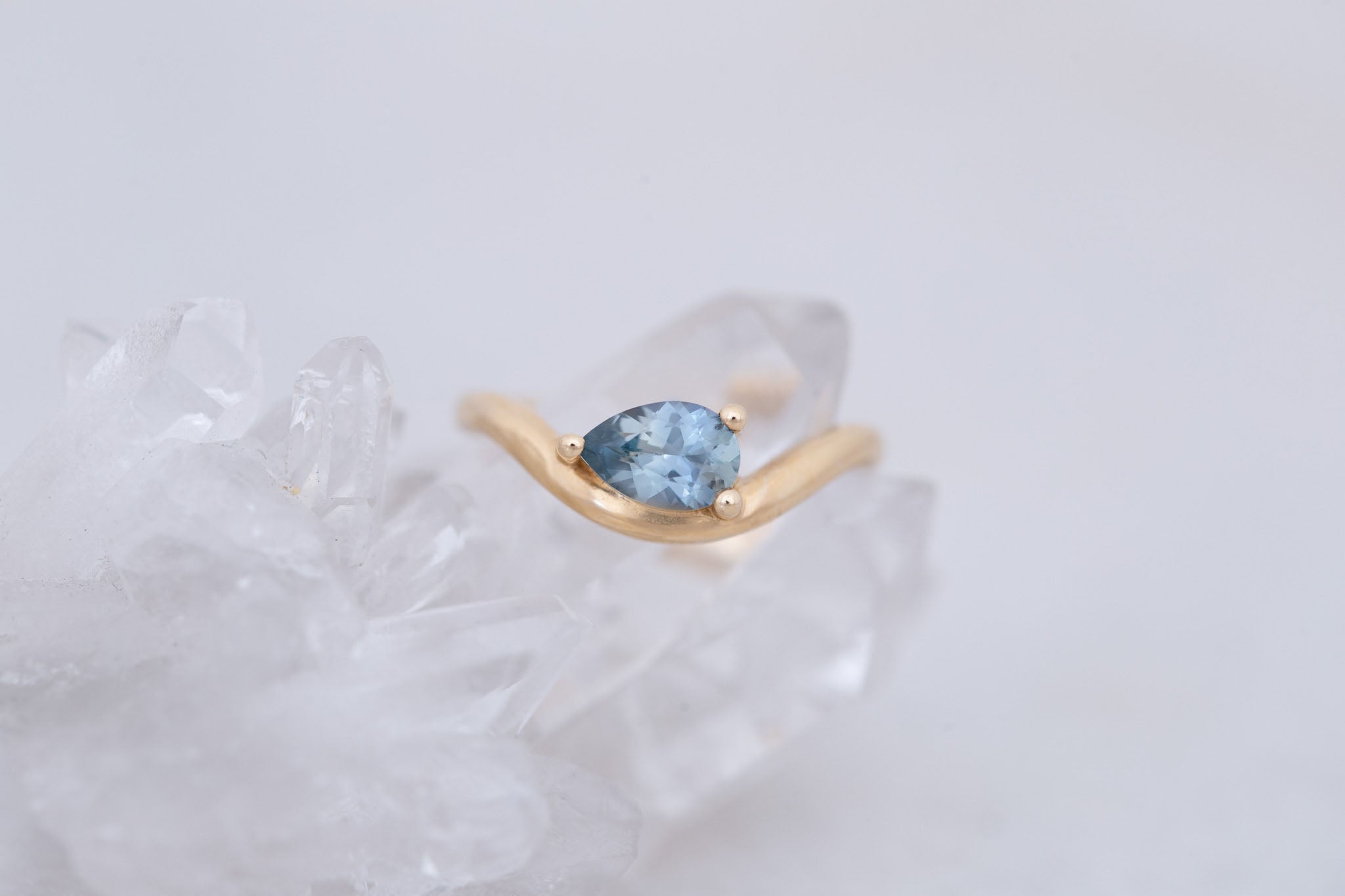 Rhodes Ring | Blue Montana Pear Cut Sapphire Solitaire + Curved Band Engagement Ring 0.88 ct | 14k Recycled Gold | One of a Kind