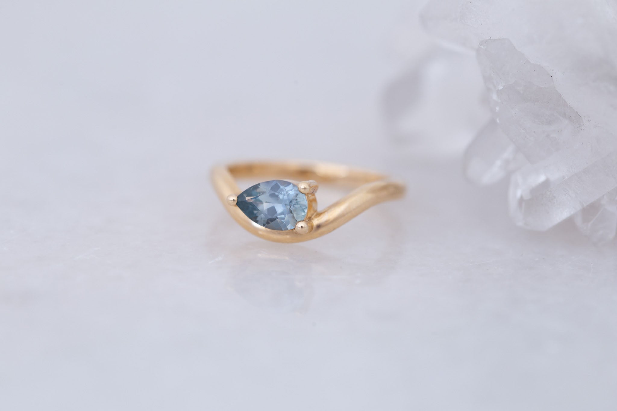 Rhodes Ring | Blue Montana Pear Cut Sapphire Solitaire + Curved Band Engagement Ring 0.88 ct | 14k Recycled Gold | One of a Kind
