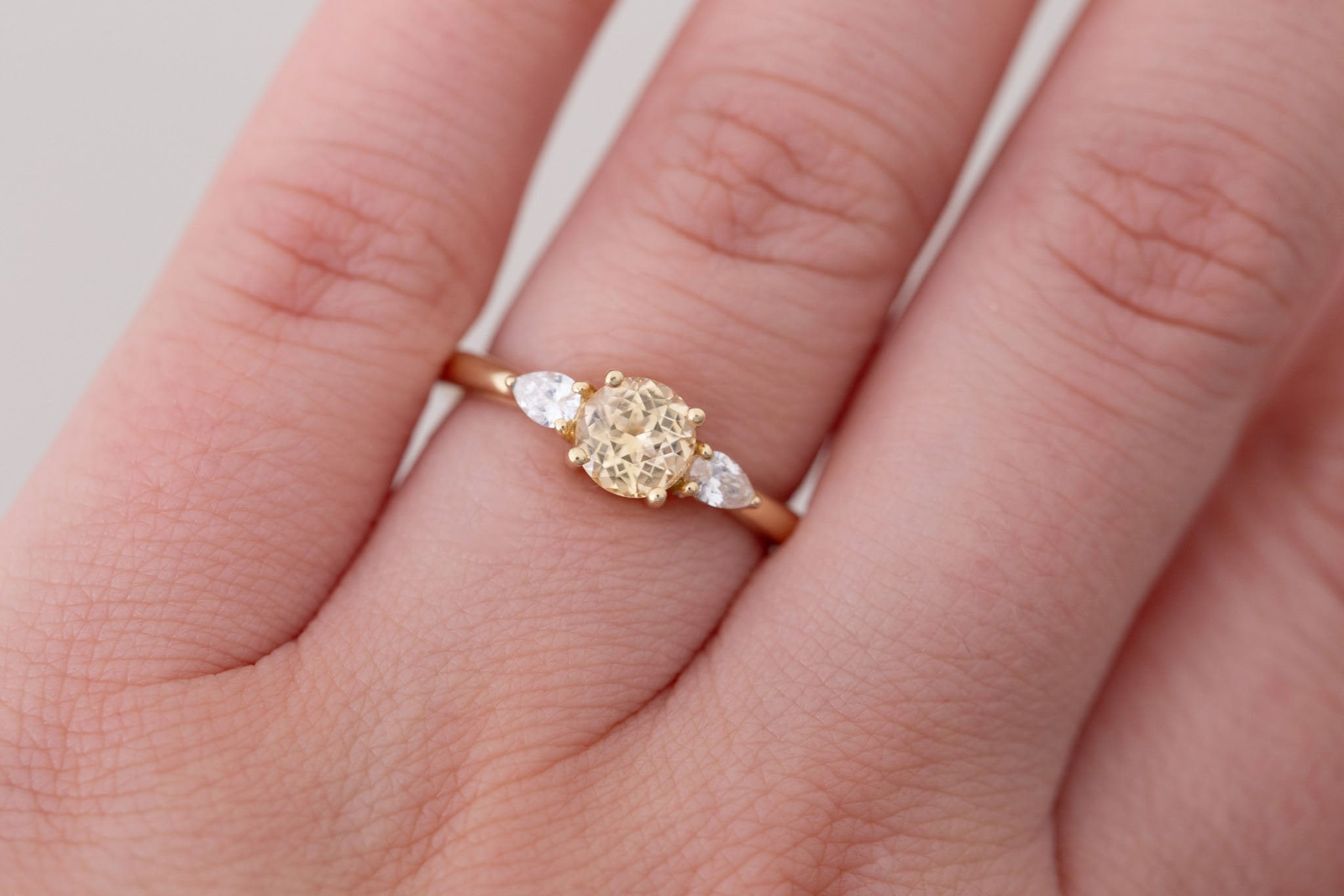 Iris Ring | Apricot Sapphire + Pear Diamond Accent Engagement Ring 0.93 ct | 14k Recycled Gold | One of a Kind