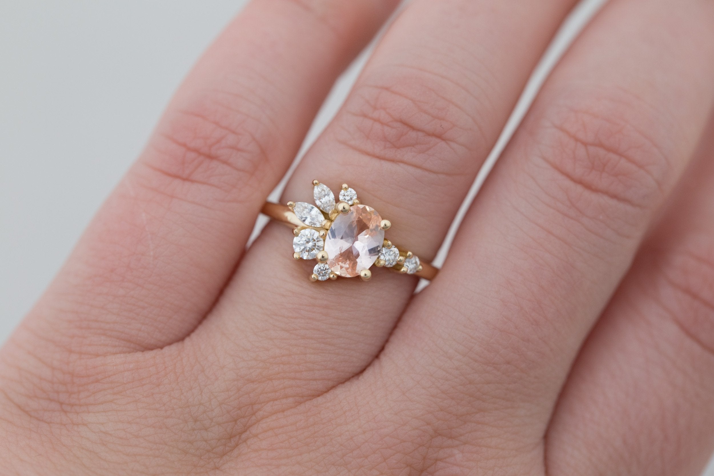 Ambretta Ring | Peach Oval Sapphire + Diamond Cluster Engagement Ring 0.95 ct | 14k Recycled Gold | One of a Kind