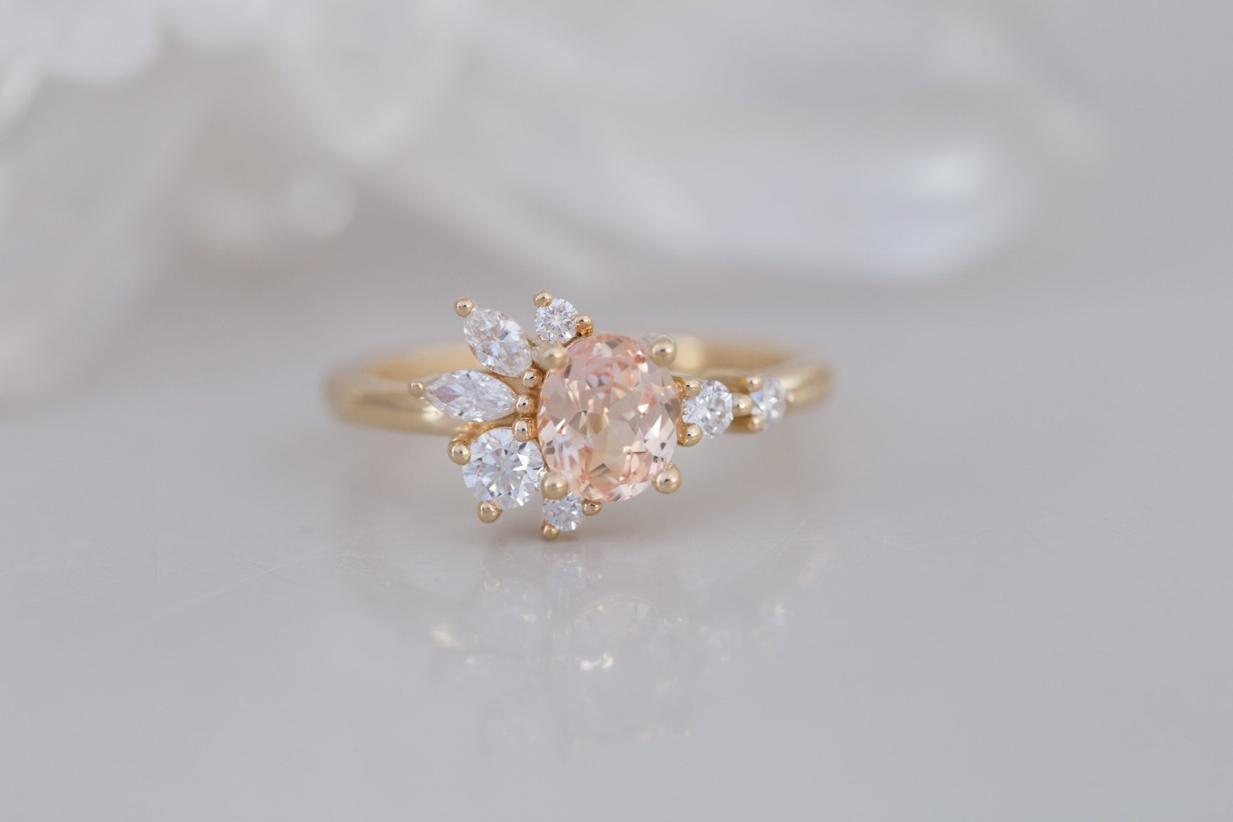 Ambretta Ring | Peach Oval Sapphire + Diamond Cluster Engagement Ring 0.96 ct | 14k Recycled Gold | One of a Kind