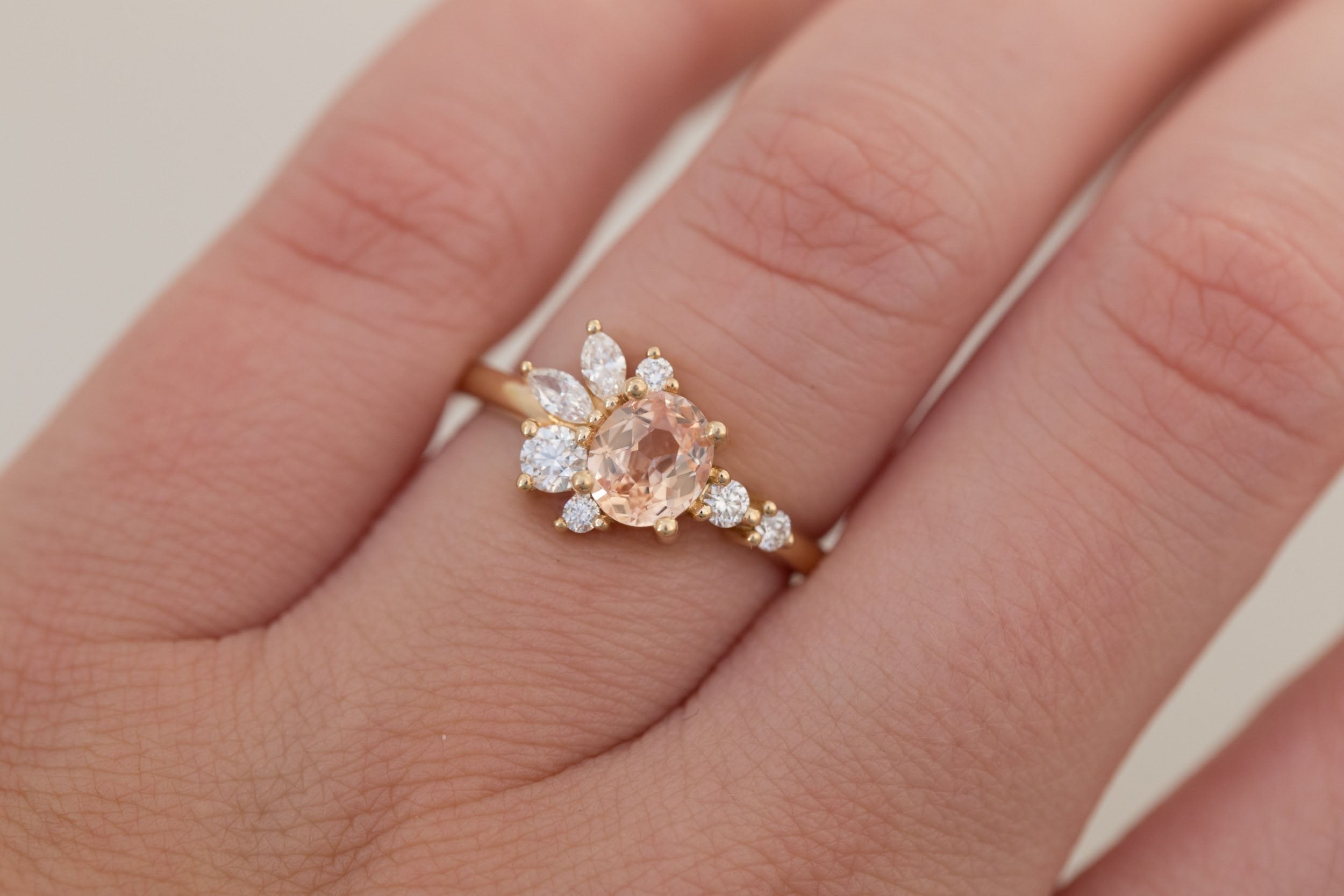 Ambretta Ring | Peach Oval Sapphire + Diamond Cluster Engagement Ring 0.96 ct | 14k Recycled Gold | One of a Kind