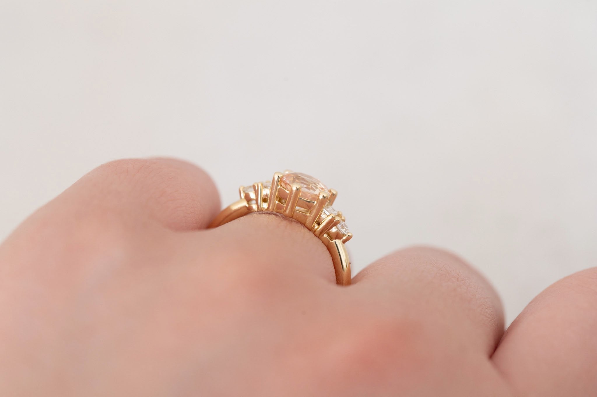 Alsea Ring | Peach Bicolor Sapphire + Baguette and Round Diamond Accent Engagement Ring 1.64 ct | 14k Recycled Gold | One of a Kind