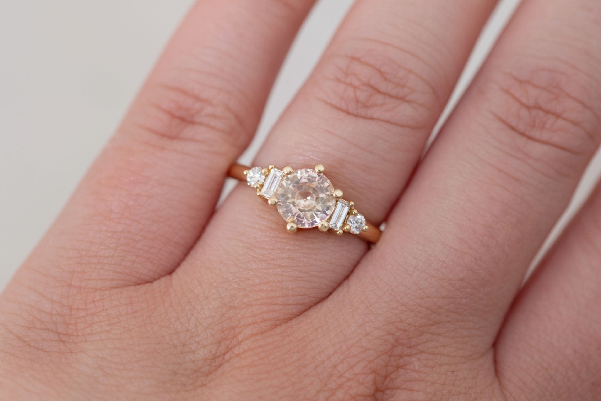 Alsea Ring | Peach Bicolor Sapphire + Baguette and Round Diamond Accent Engagement Ring 1.64 ct | 14k Recycled Gold | One of a Kind