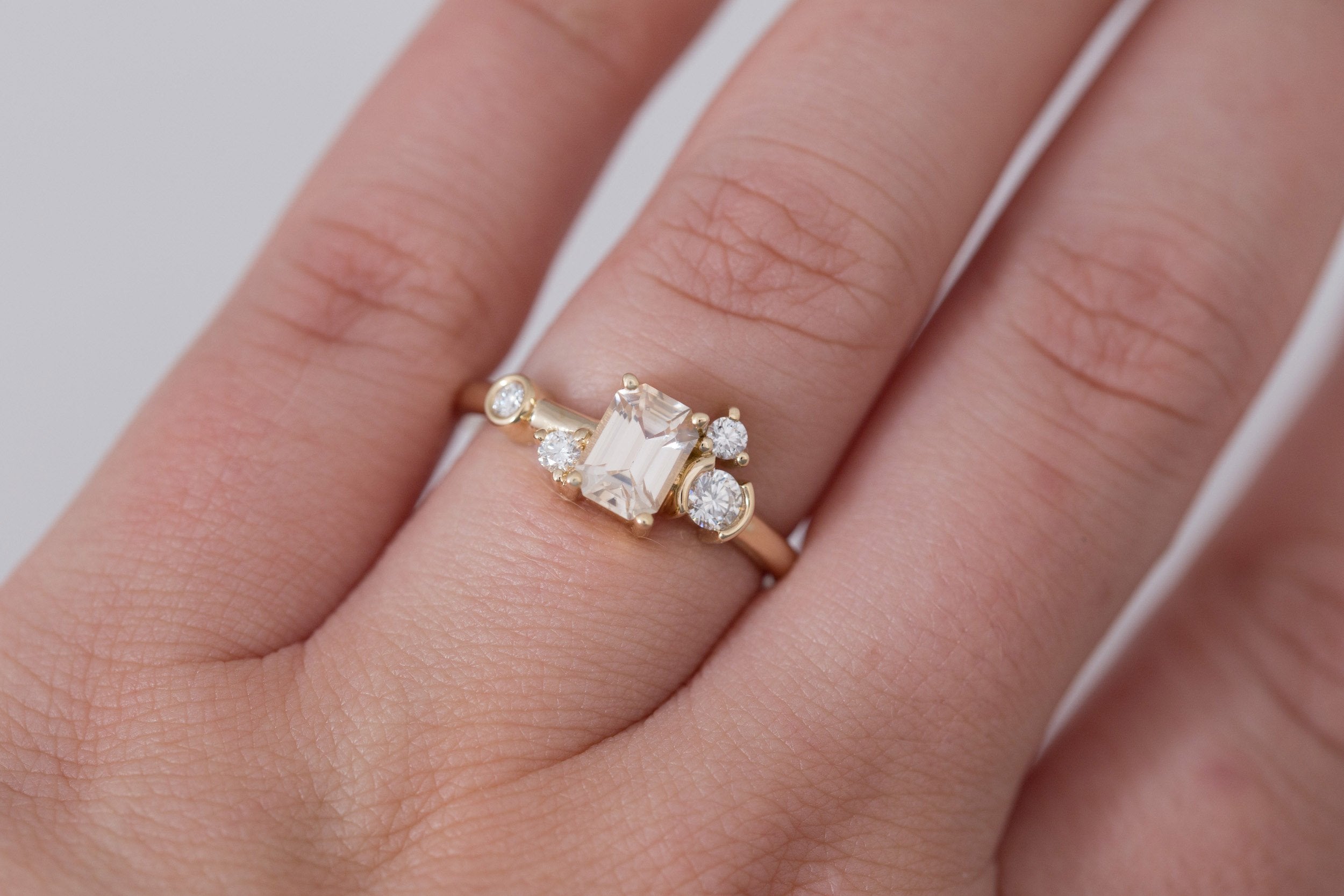 Mae Ring | Emerald Cut Apricot Sapphire + Diamond Cluster Ring 1.09 | 14k Recycled Gold | One of a Kind