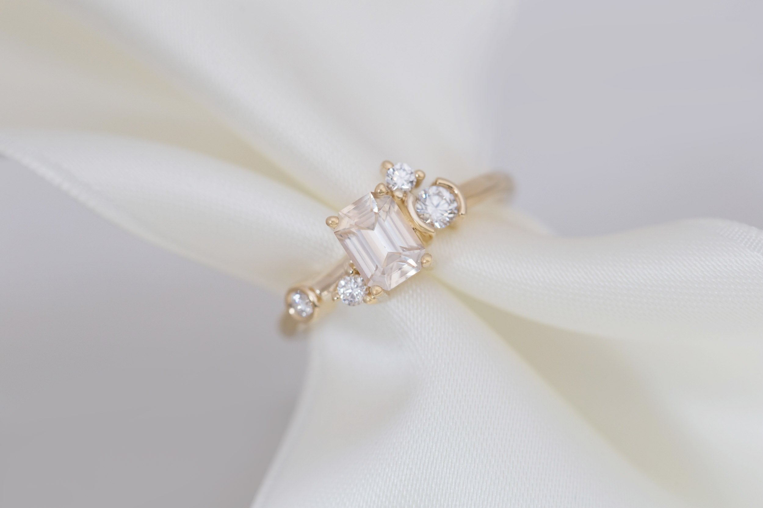 Mae Ring | Emerald Cut Apricot Sapphire + Diamond Cluster Ring 1.09 | 14k Recycled Gold | One of a Kind