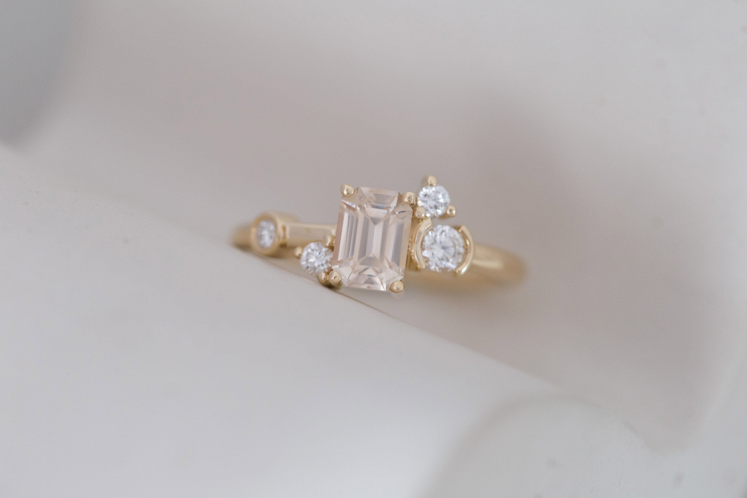 Mae Ring | Emerald Cut Apricot Sapphire + Diamond Cluster Ring 1.09 | 14k Recycled Gold | One of a Kind