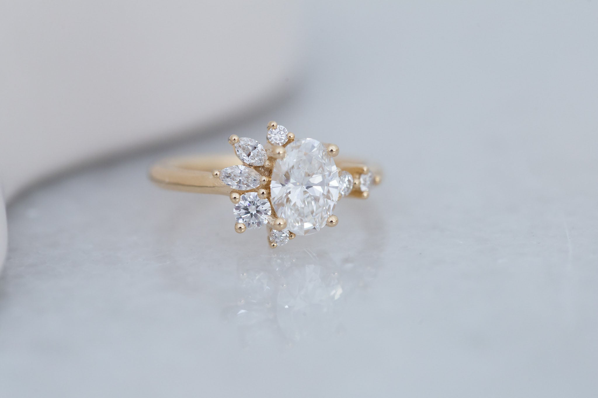 Ambretta Ring | Lab Oval Diamond + Lab Diamond Cluster Engagement Ring 1.10 ct | 14k Recycled Gold | One of a Kind