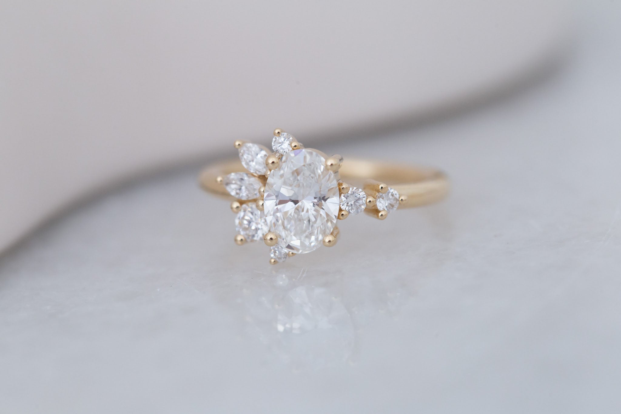 Ambretta Ring | Lab Oval Diamond + Lab Diamond Cluster Engagement Ring 1.10 ct | 14k Recycled Gold | One of a Kind