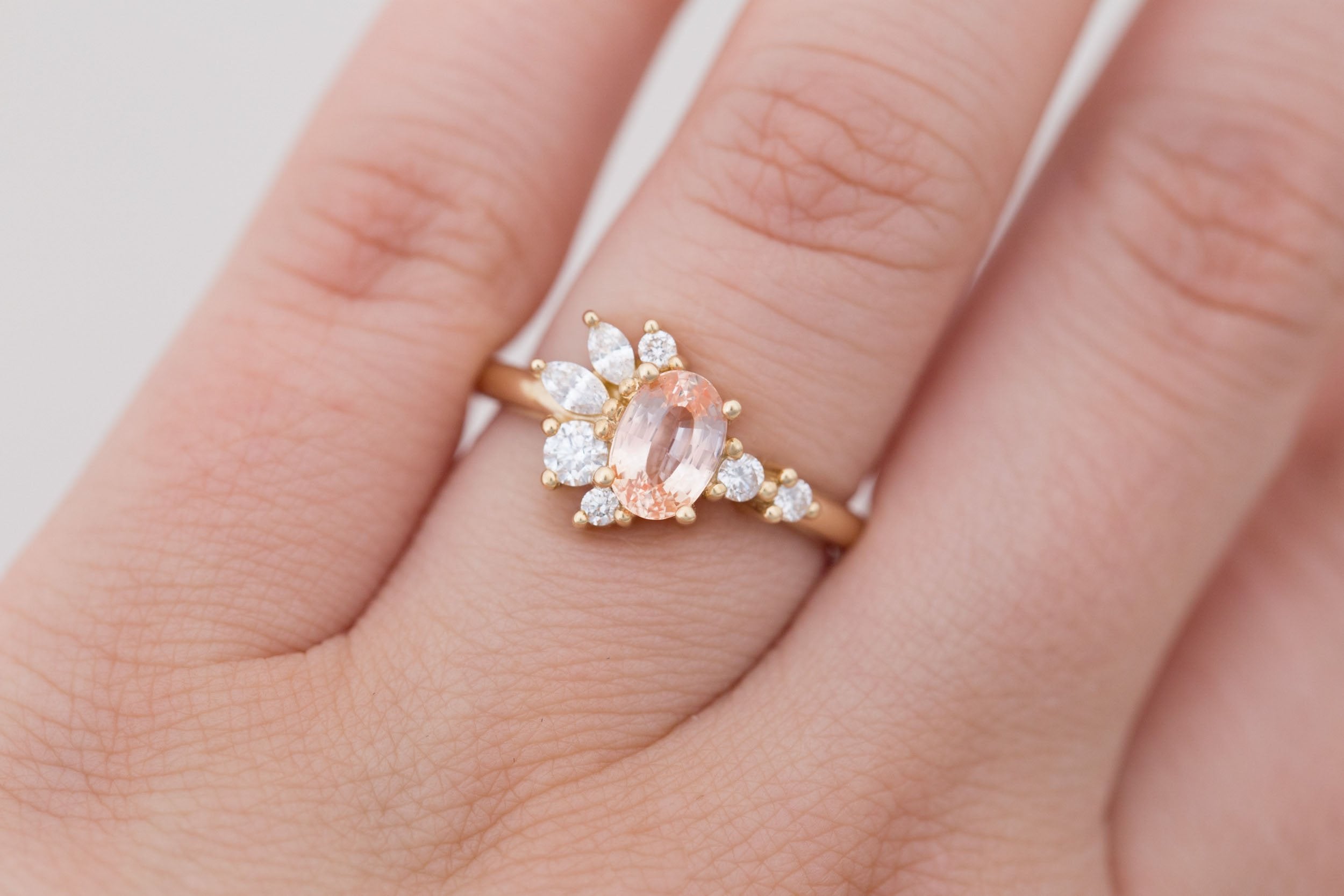Ambretta Ring | Peach Oval Sapphire + Diamond Cluster Engagement Ring 1.11 ct | 14k Recycled Gold | One of a Kind
