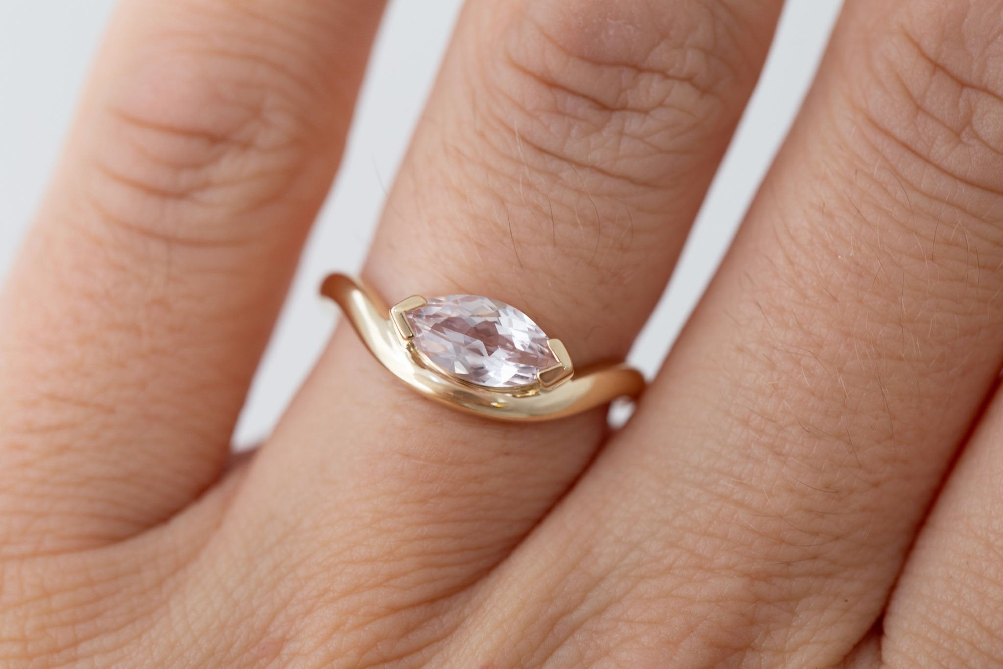 Rhodes Ring | Blush Marquise Sapphire Solitaire + Curved Band Engagement Ring 1.13 ct | 14k Recycled Gold | One of a Kind