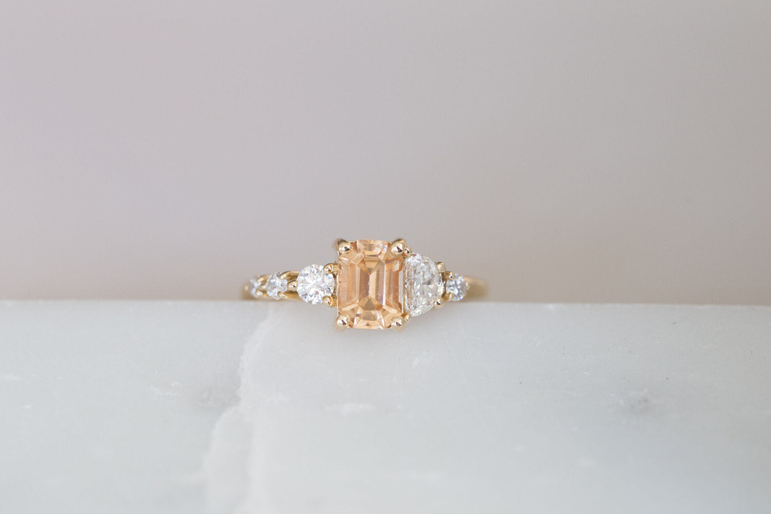 Sarine Ring | Apricot Sapphire + Half Moon Diamond + Diamond Cluster Engagement Ring | 14k Recycled Gold | One of a Kind