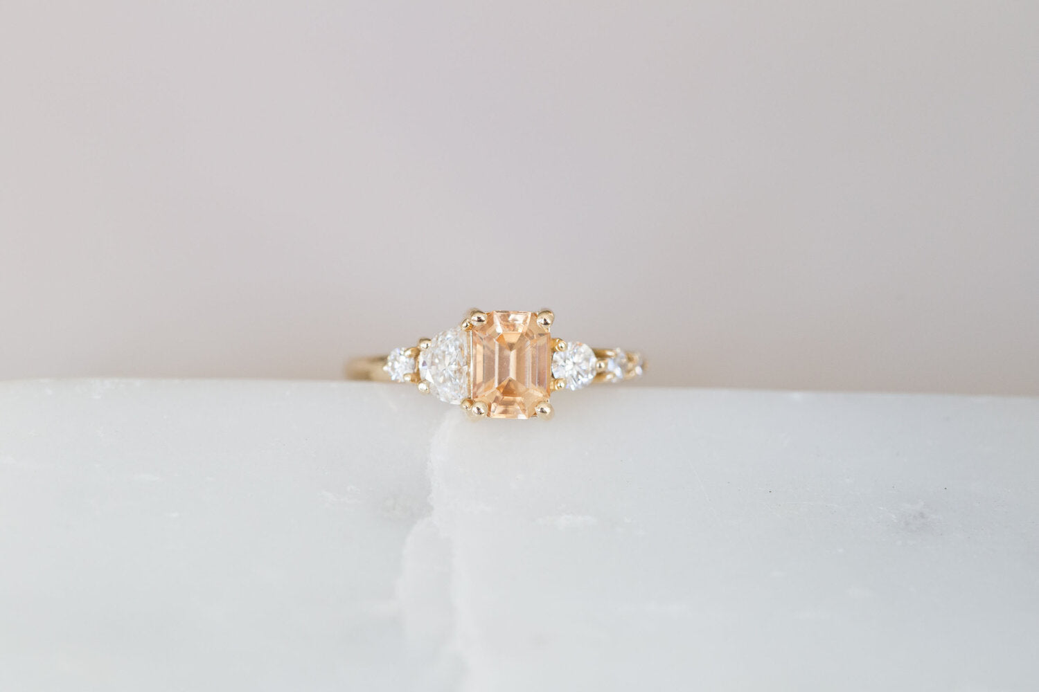 Sarine Ring | Apricot Sapphire + Half Moon Diamond + Diamond Cluster Engagement Ring | 14k Recycled Gold | One of a Kind