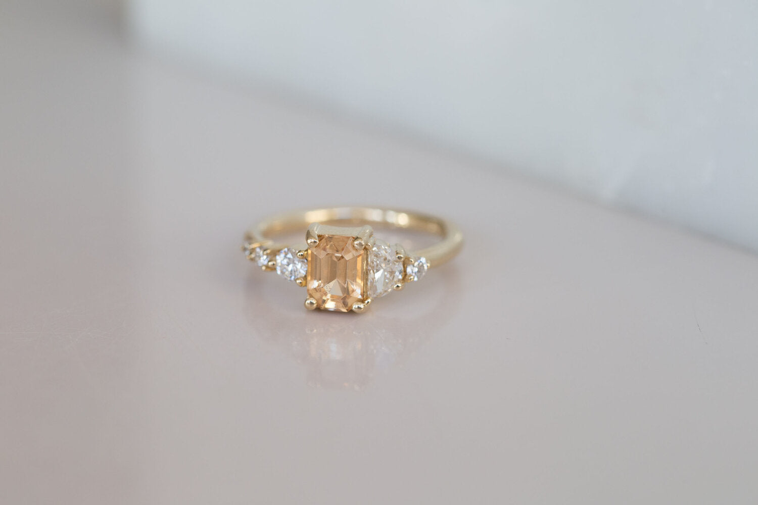 Sarine Ring | Apricot Sapphire + Half Moon Diamond + Diamond Cluster Engagement Ring | 14k Recycled Gold | One of a Kind