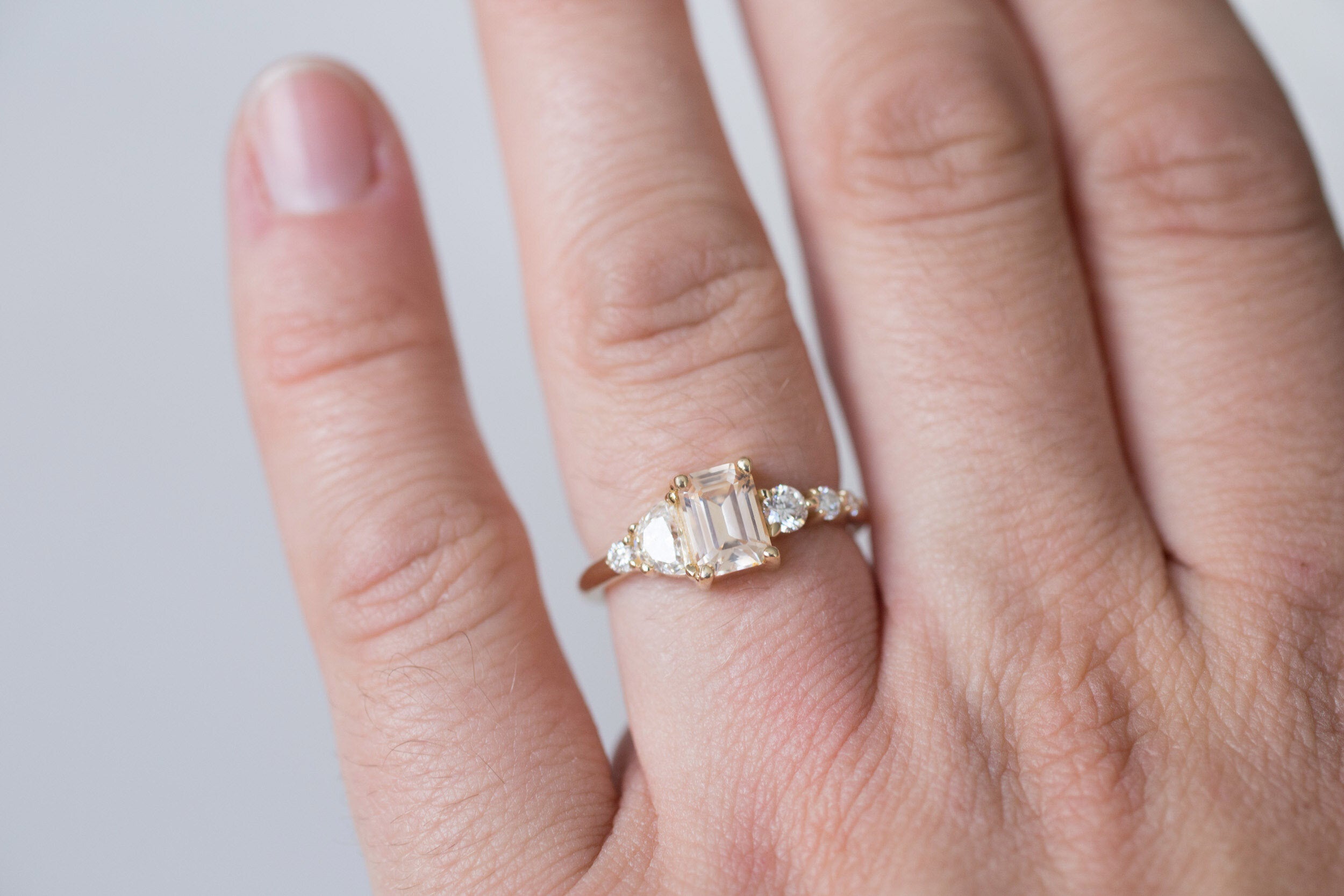 Sarine Ring | Apricot Sapphire + Half Moon Diamond + Diamond Cluster Engagement Ring 1.15 ct | 14k Recycled Gold | One of a Kind
