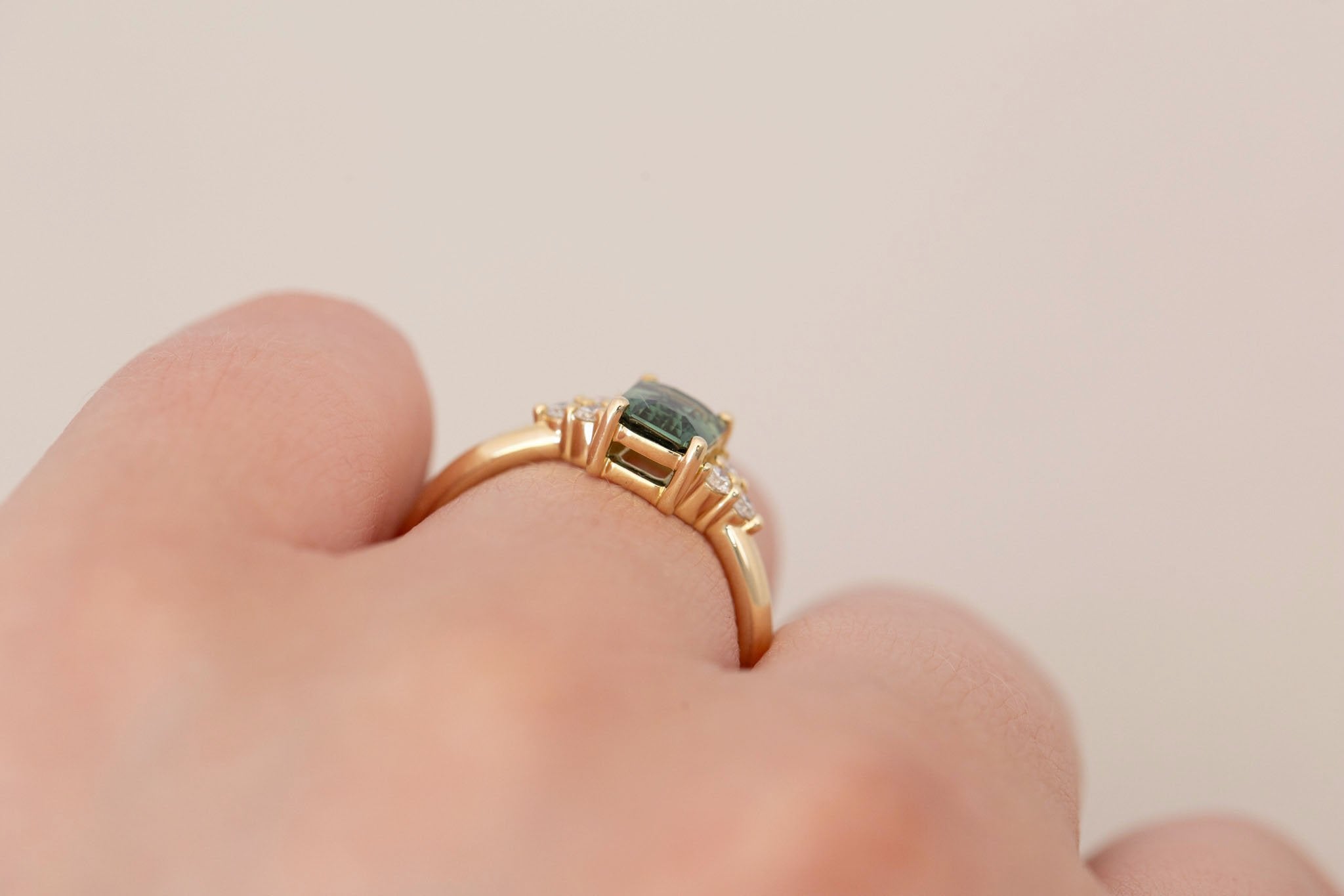 Verona Ring | Bicolor Green Emerald Cut Sapphire + Round Diamond Accents Engagement Ring 1.16 ct | 14k Recycled Gold | One of a Kind