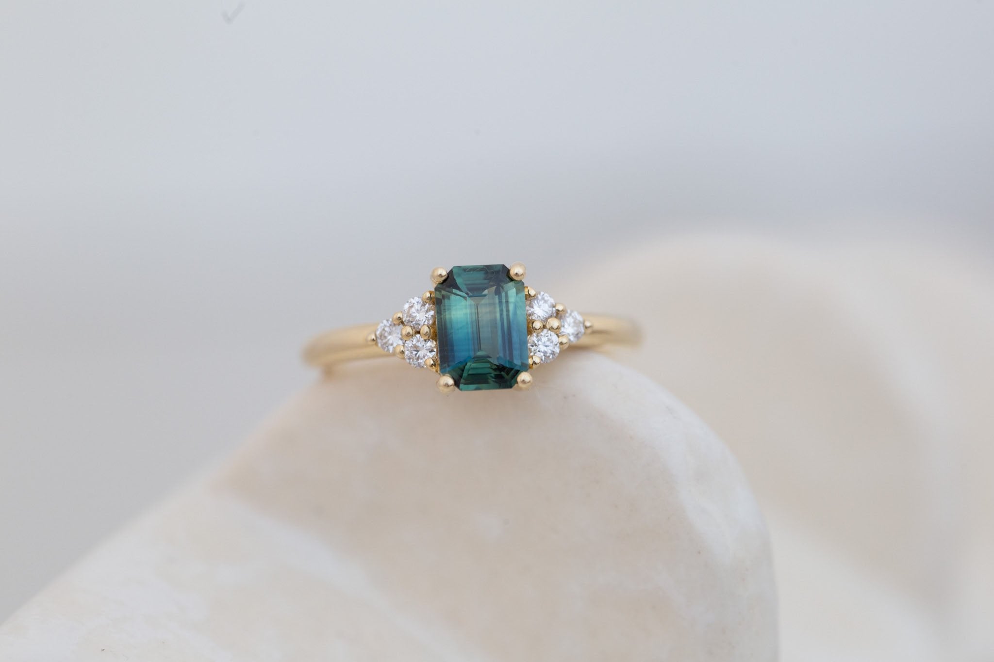 Verona Ring | Bicolor Green Emerald Cut Sapphire + Round Diamond Accents Engagement Ring 1.16 ct | 14k Recycled Gold | One of a Kind