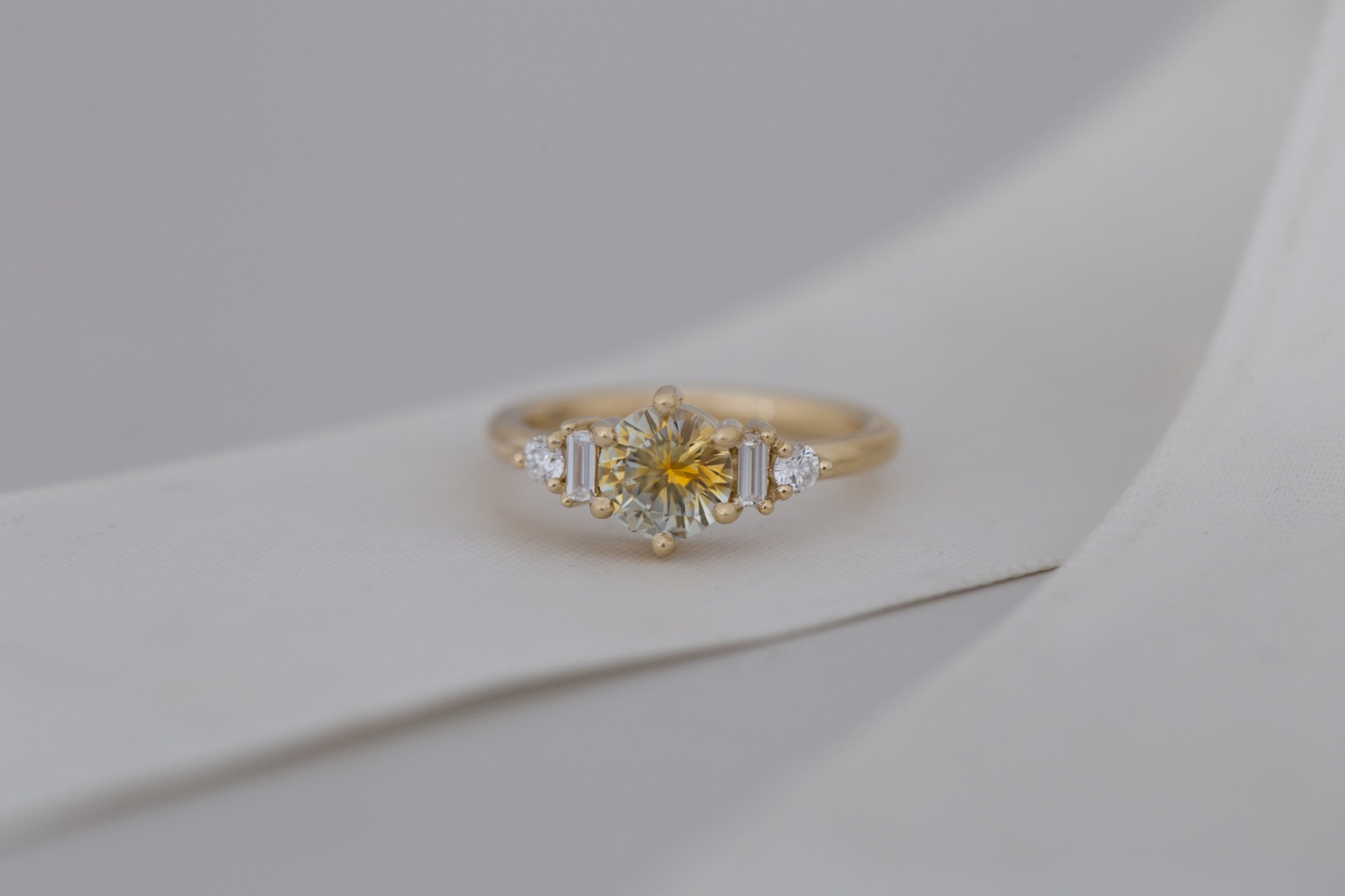 Alsea Ring | Bicolor Montana Sapphire + Baguette and Round Diamond Accent Engagement Ring 1.21 ct | 14k Recycled Gold | One of a Kind