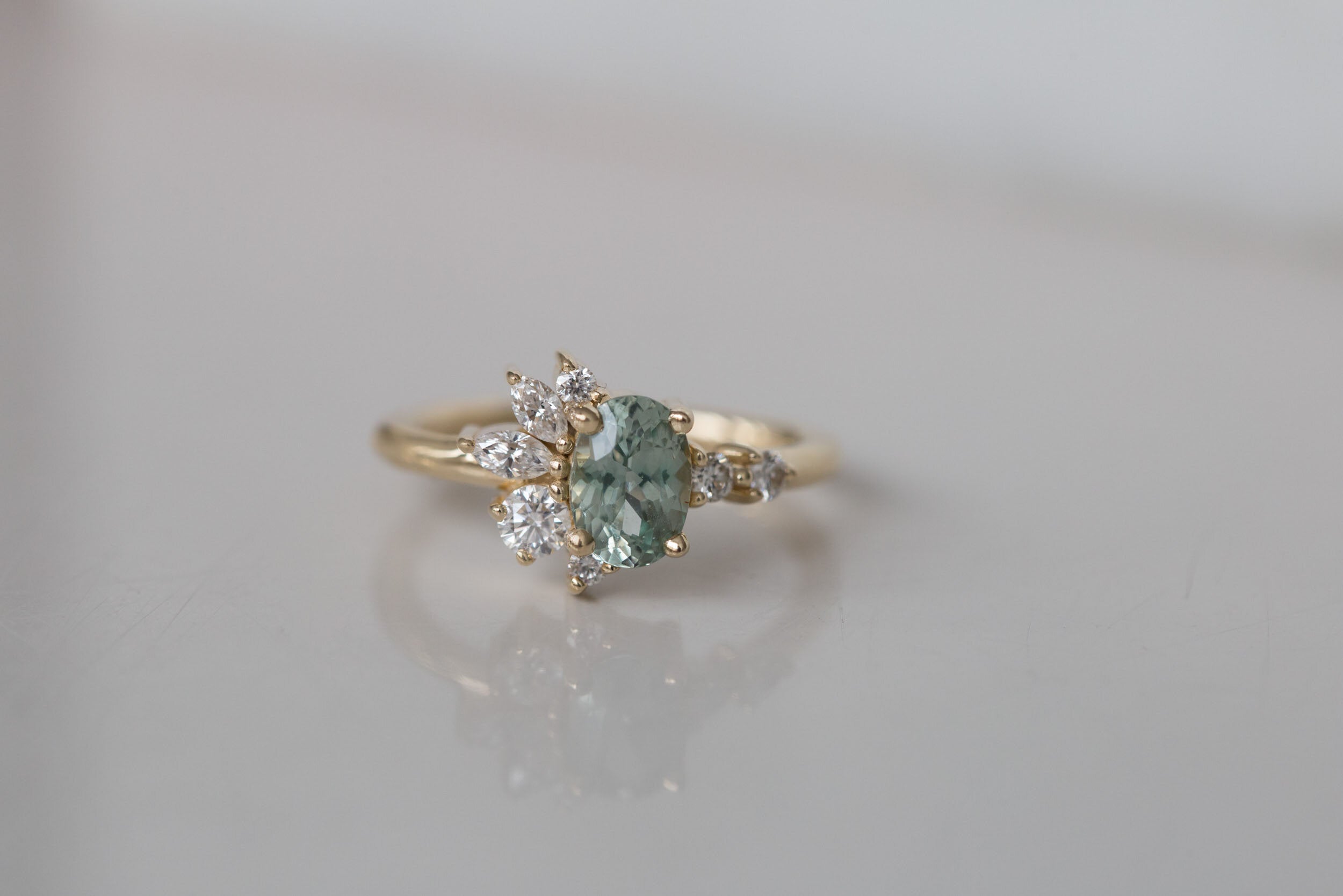 Ambretta Ring | Oval Mint Sapphire + Diamond Cluster Engagement Ring | 14k Recycled Gold | One of a Kind