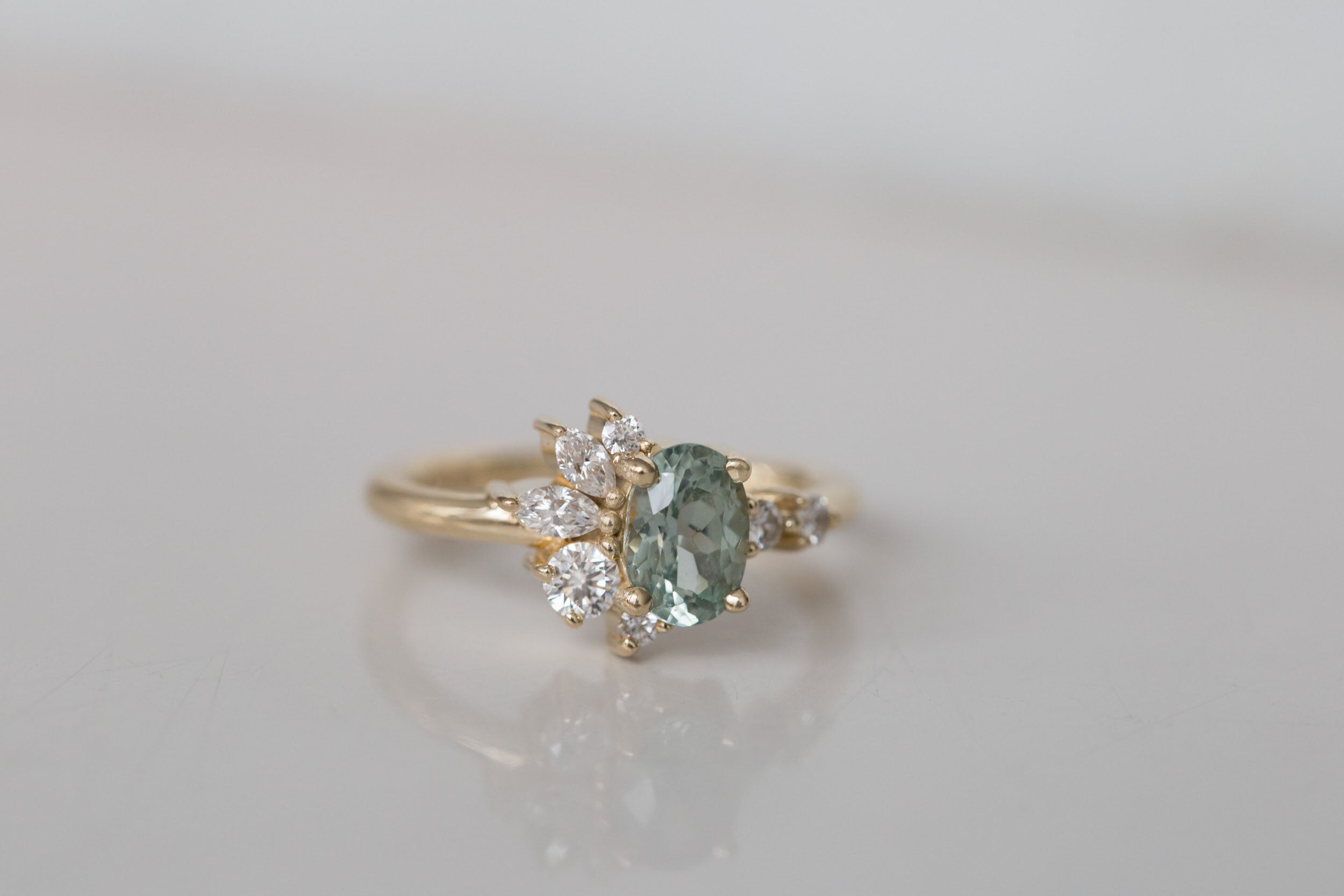 Ambretta Ring | Oval Mint Sapphire + Diamond Cluster Engagement Ring | 14k Recycled Gold | One of a Kind