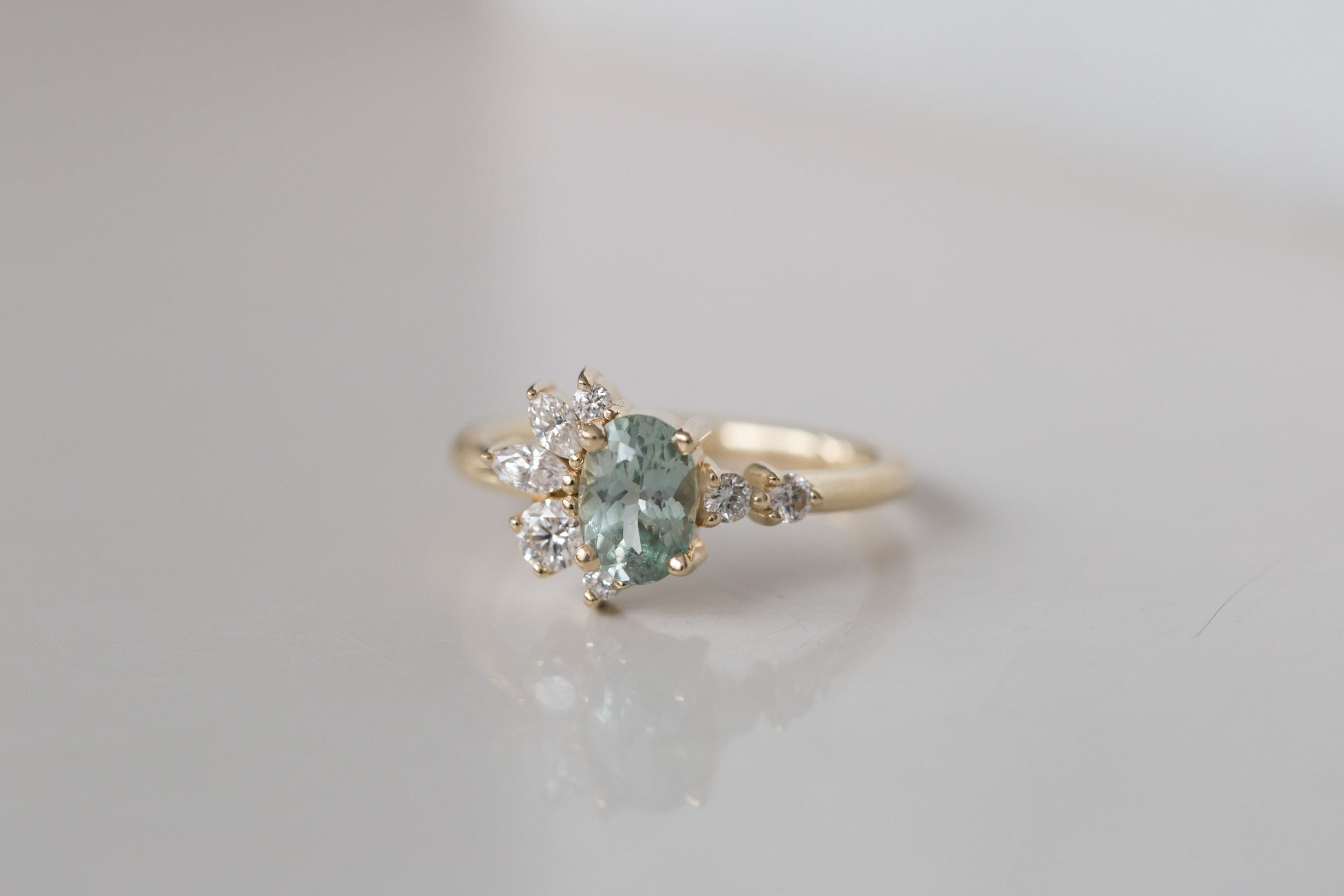 Ambretta Ring | Oval Mint Sapphire + Diamond Cluster Engagement Ring | 14k Recycled Gold | One of a Kind