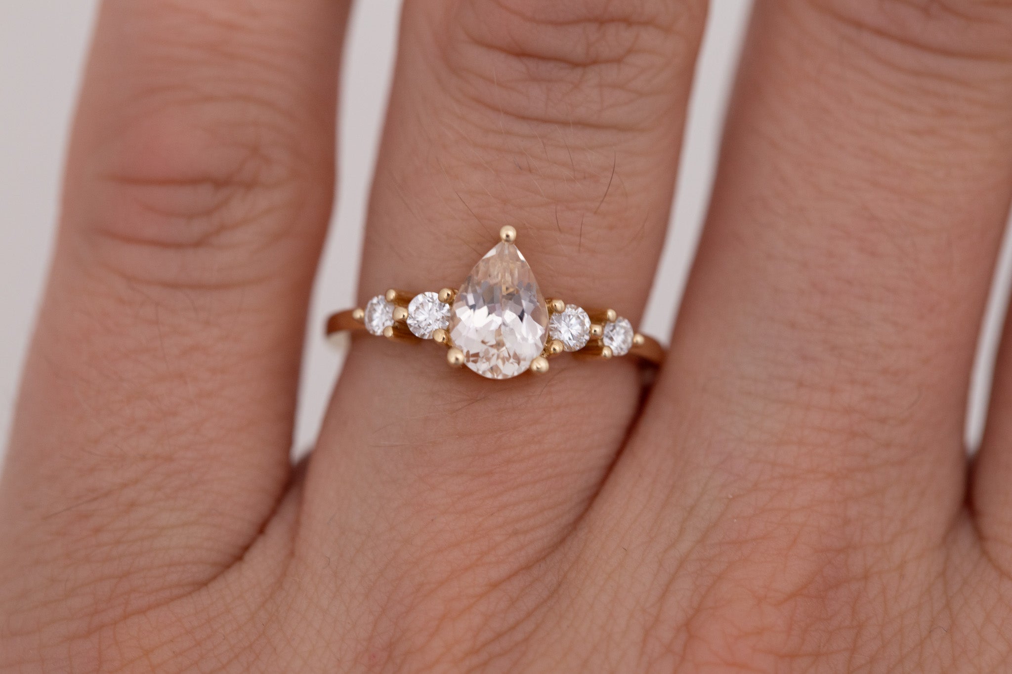 Arbor Ring | Icy Blush Pear Sapphire + Round Diamond Accent Engagement Ring 1.24 ct | 14k Recycled Gold | One of a Kind