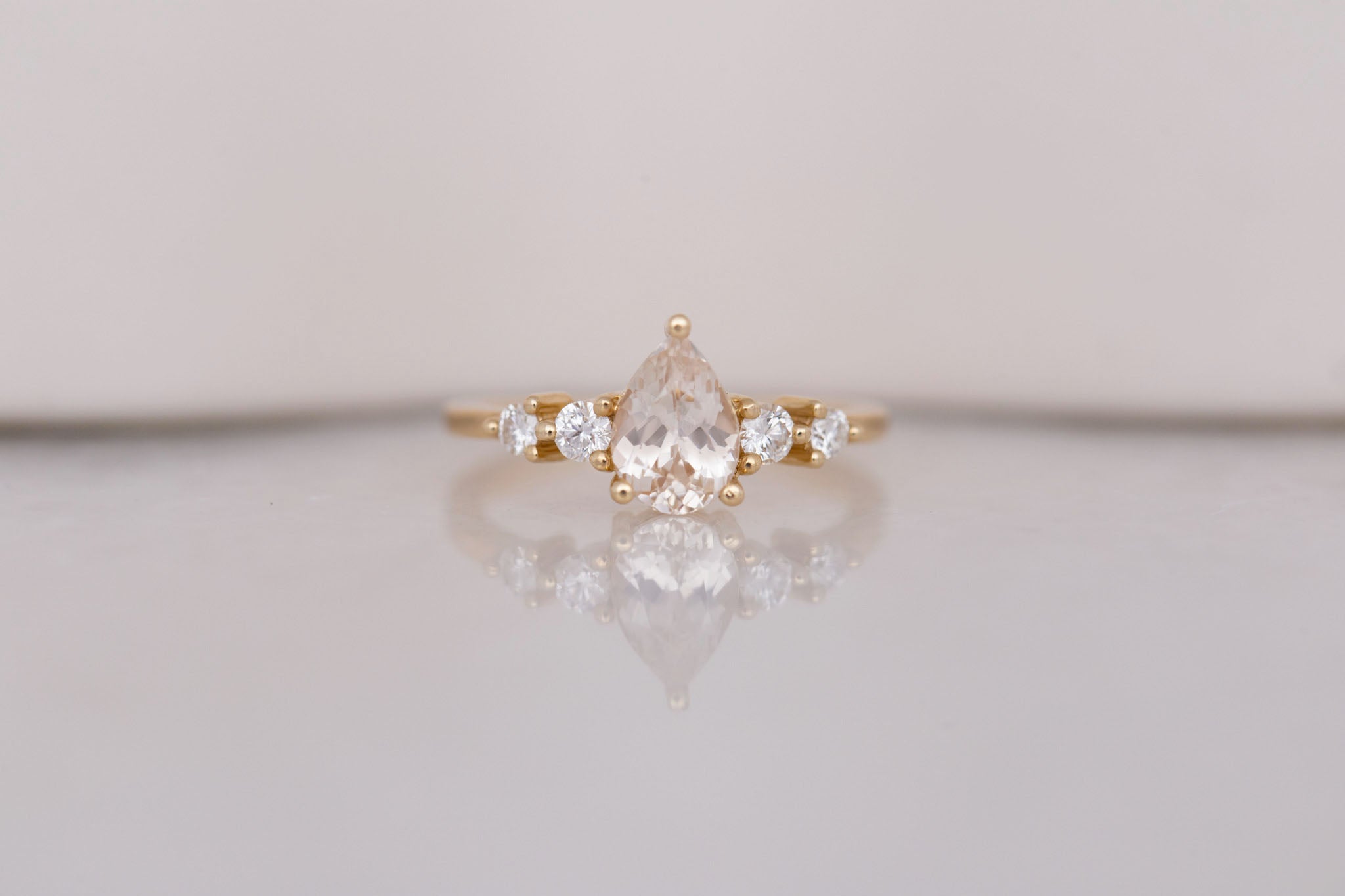 Arbor Ring | Icy Blush Pear Sapphire + Round Diamond Accent Engagement Ring 1.24 ct | 14k Recycled Gold | One of a Kind