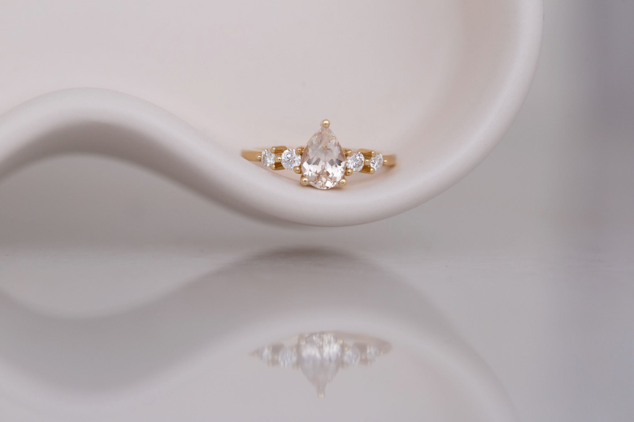 Arbor Ring | Icy Blush Pear Sapphire + Round Diamond Accent Engagement Ring 1.24 ct | 14k Recycled Gold | One of a Kind