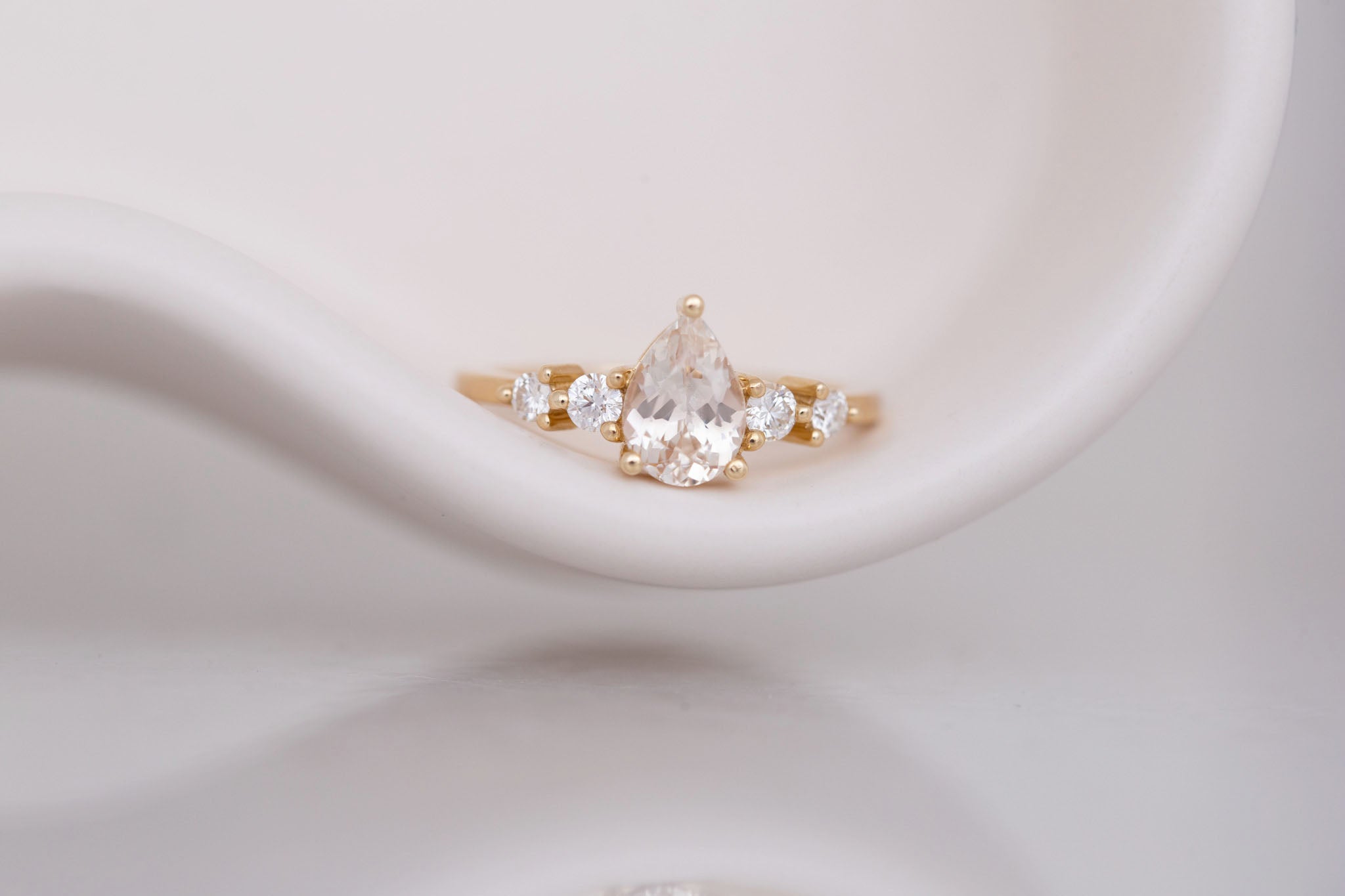 Arbor Ring | Icy Blush Pear Sapphire + Round Diamond Accent Engagement Ring 1.24 ct | 14k Recycled Gold | One of a Kind