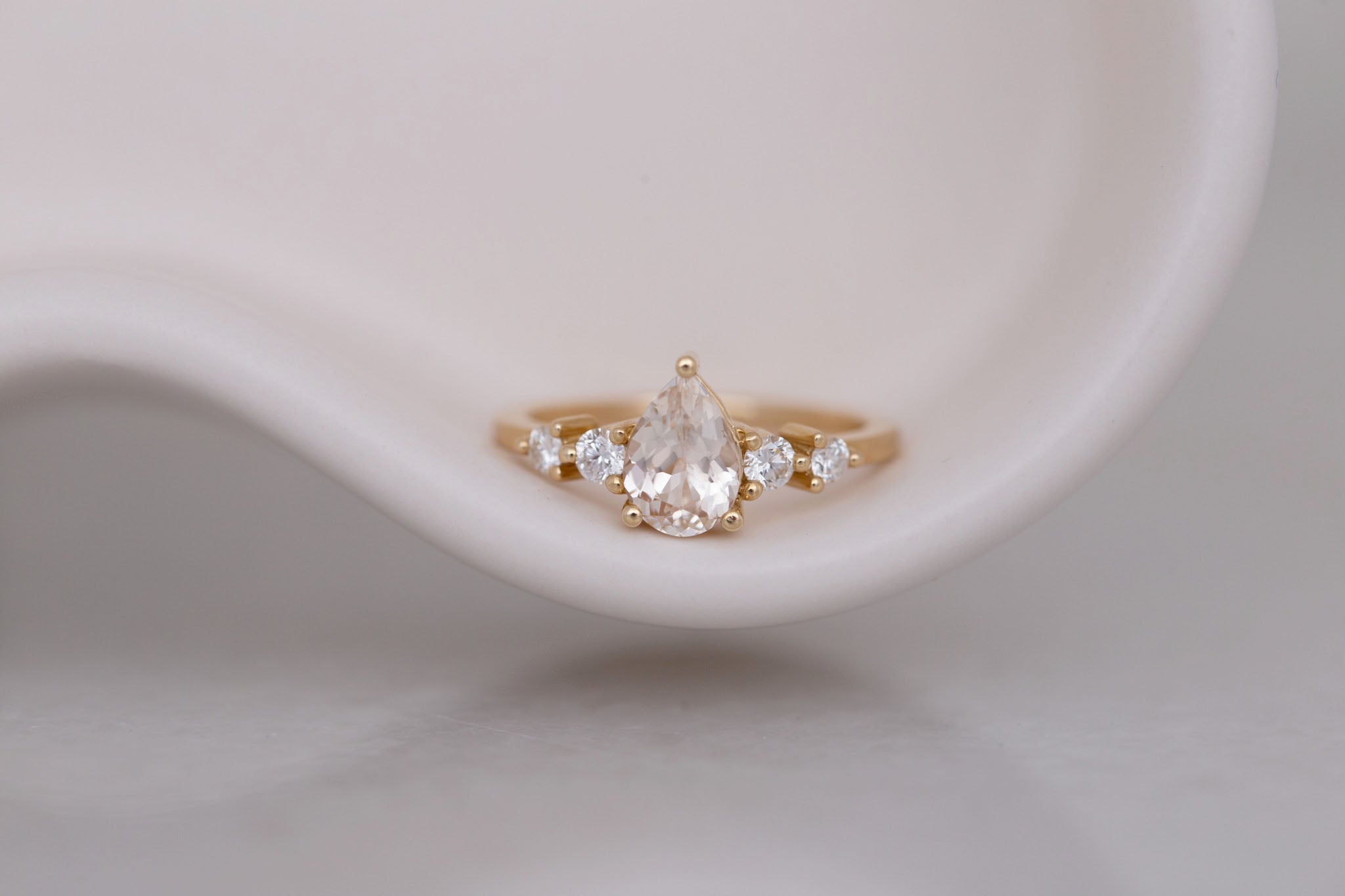 Arbor Ring | Icy Blush Pear Sapphire + Round Diamond Accent Engagement Ring 1.24 ct | 14k Recycled Gold | One of a Kind