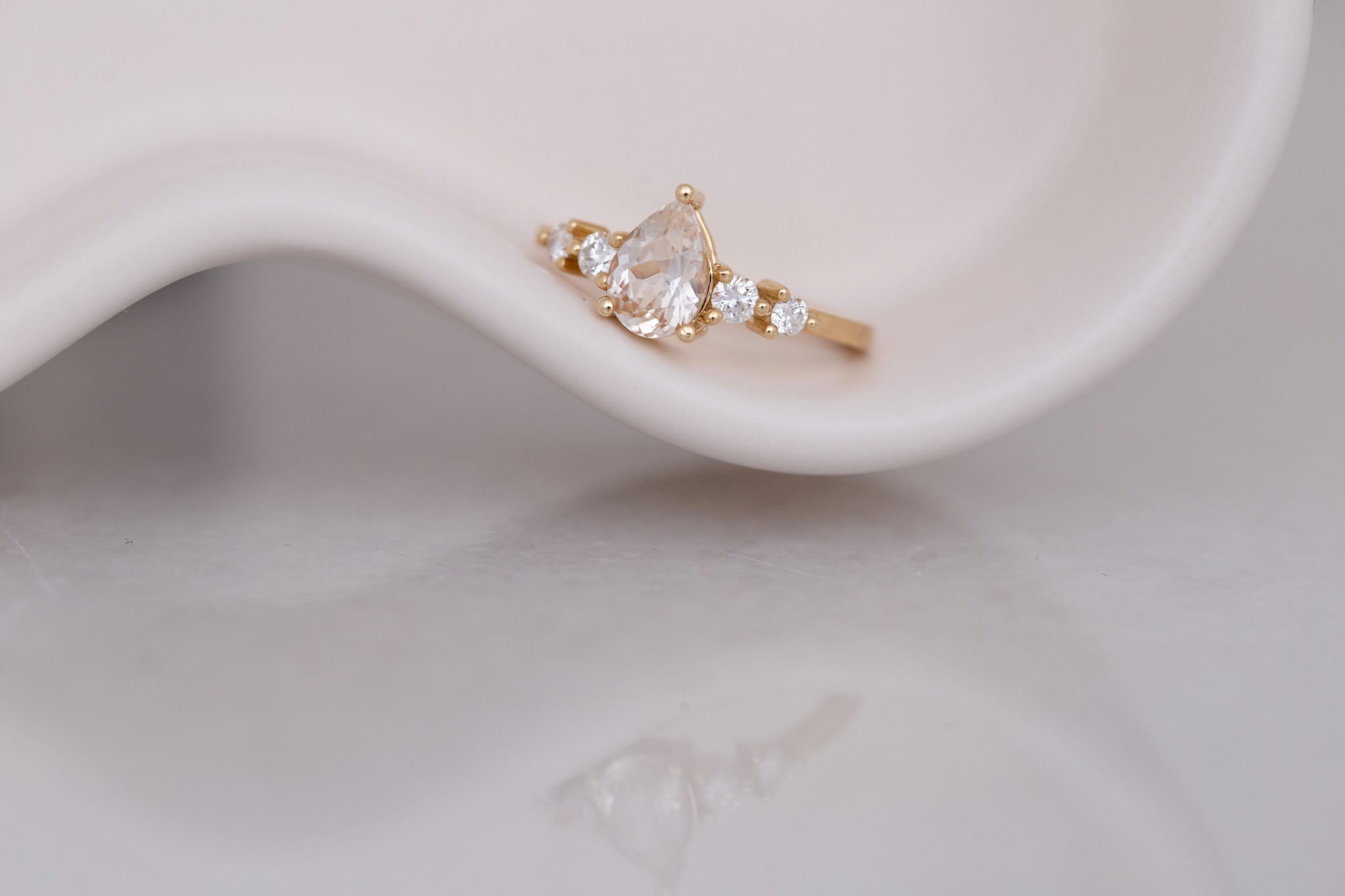 Arbor Ring | Icy Blush Pear Sapphire + Round Diamond Accent Engagement Ring 1.24 ct | 14k Recycled Gold | One of a Kind