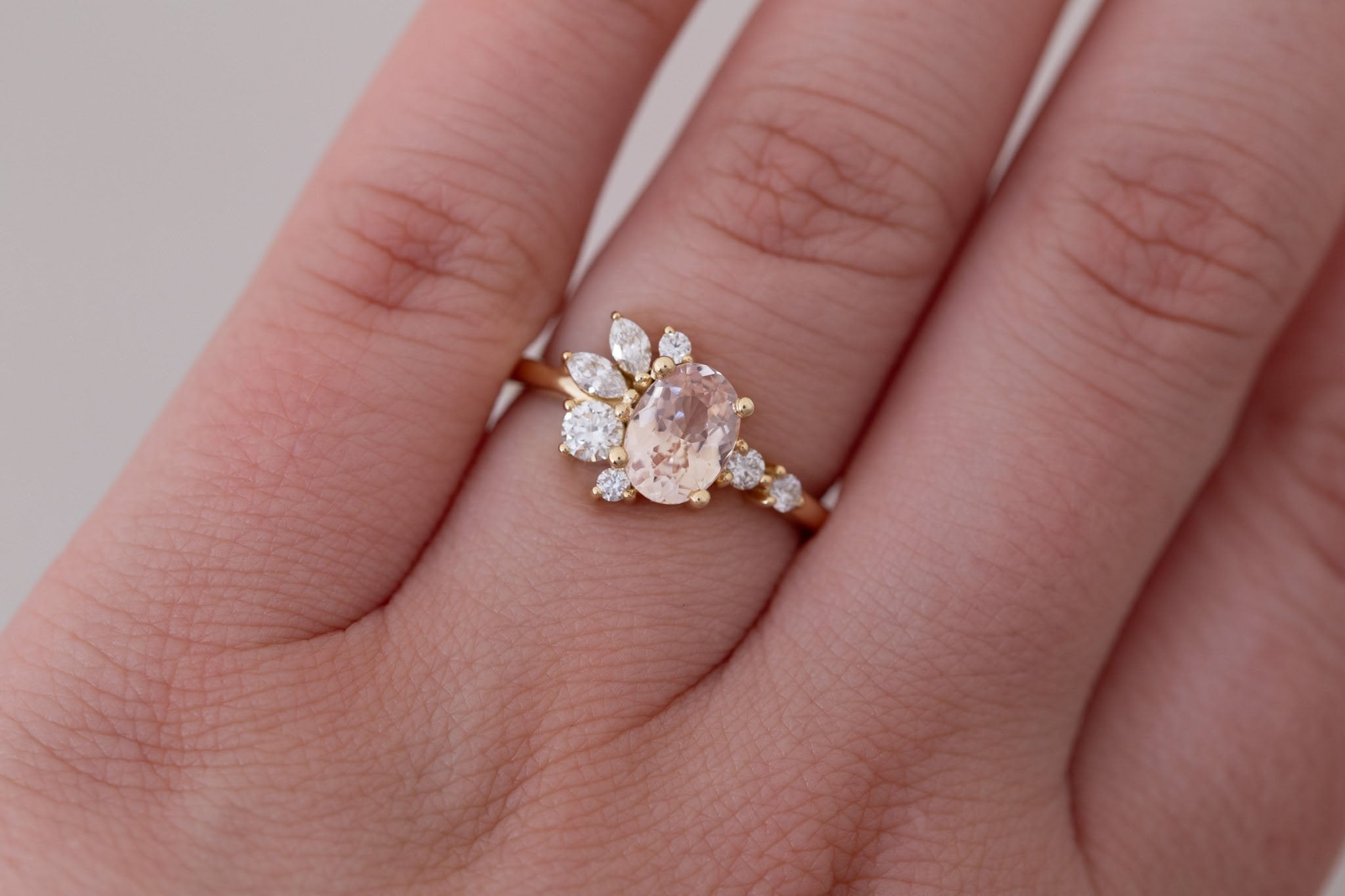Ambretta Ring | Peach Oval Sapphire + Diamond Cluster Engagement Ring 1.27 ct | 14k Recycled Gold | One of a Kind