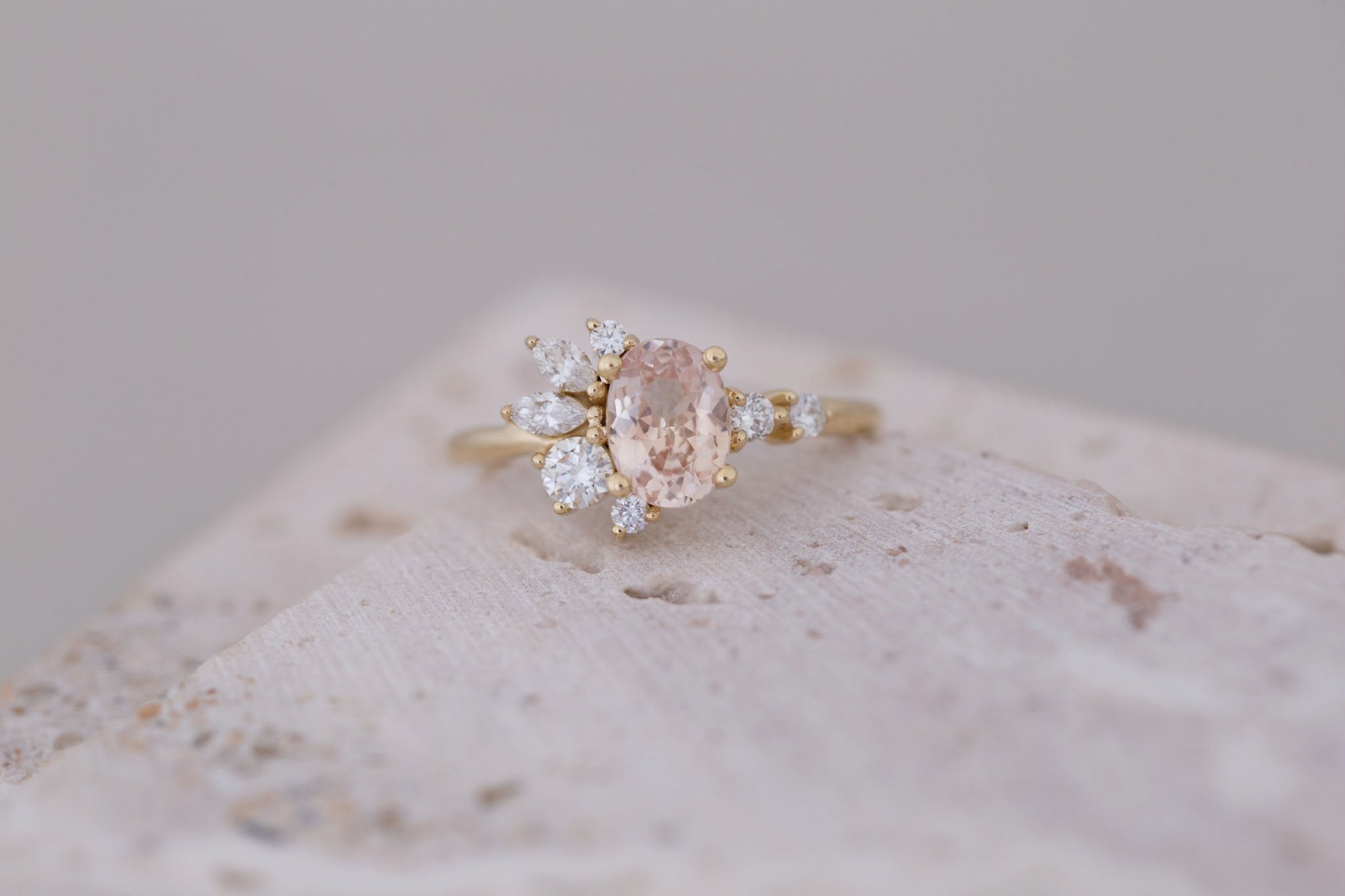 Ambretta Ring | Peach Oval Sapphire + Diamond Cluster Engagement Ring 1.27 ct | 14k Recycled Gold | One of a Kind