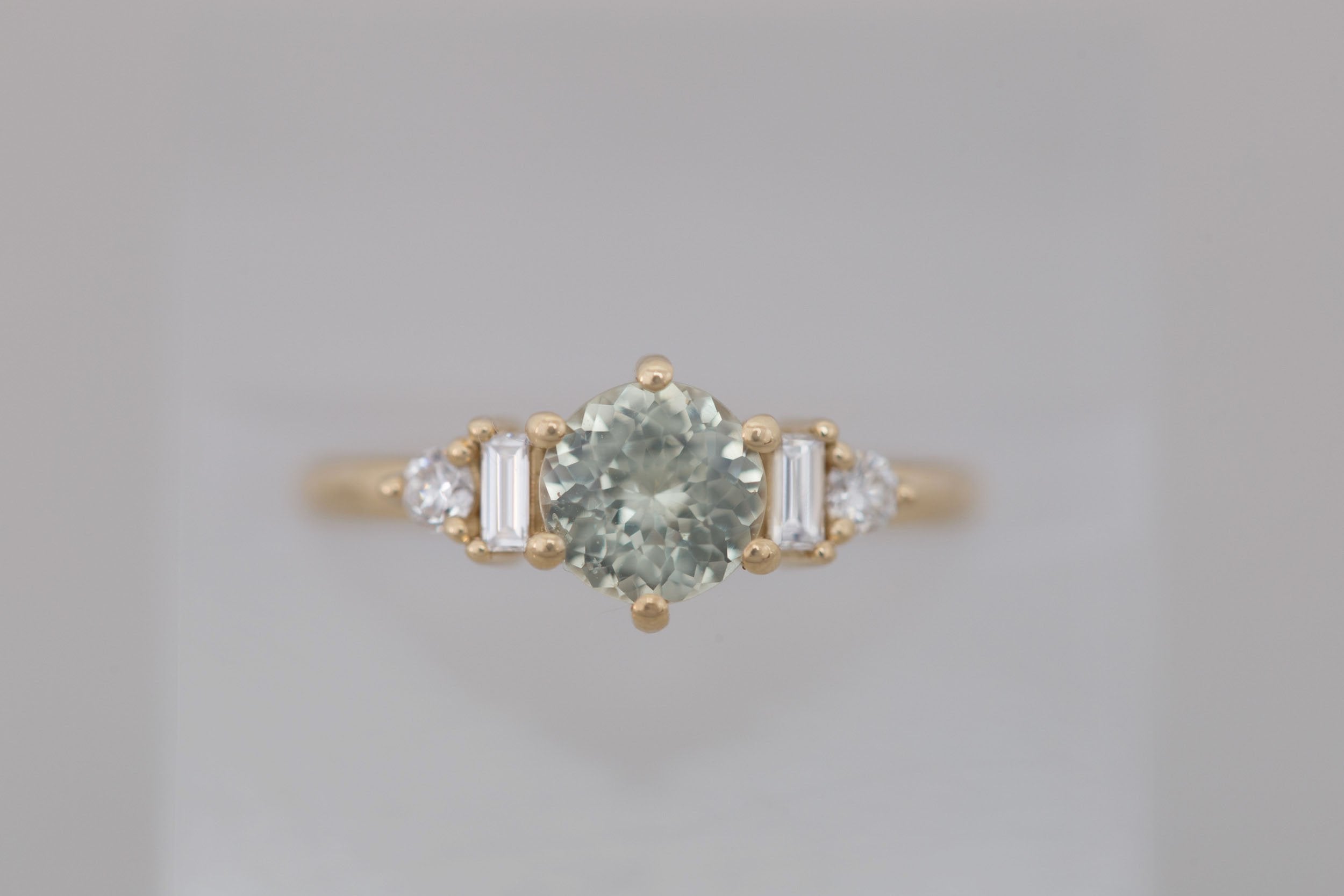 Alsea Ring | Mint Round Sapphire + Baguette and Round Diamond Accent Engagement Ring 1.29 ct | 14k Recycled Yellow Gold | One of a Kind