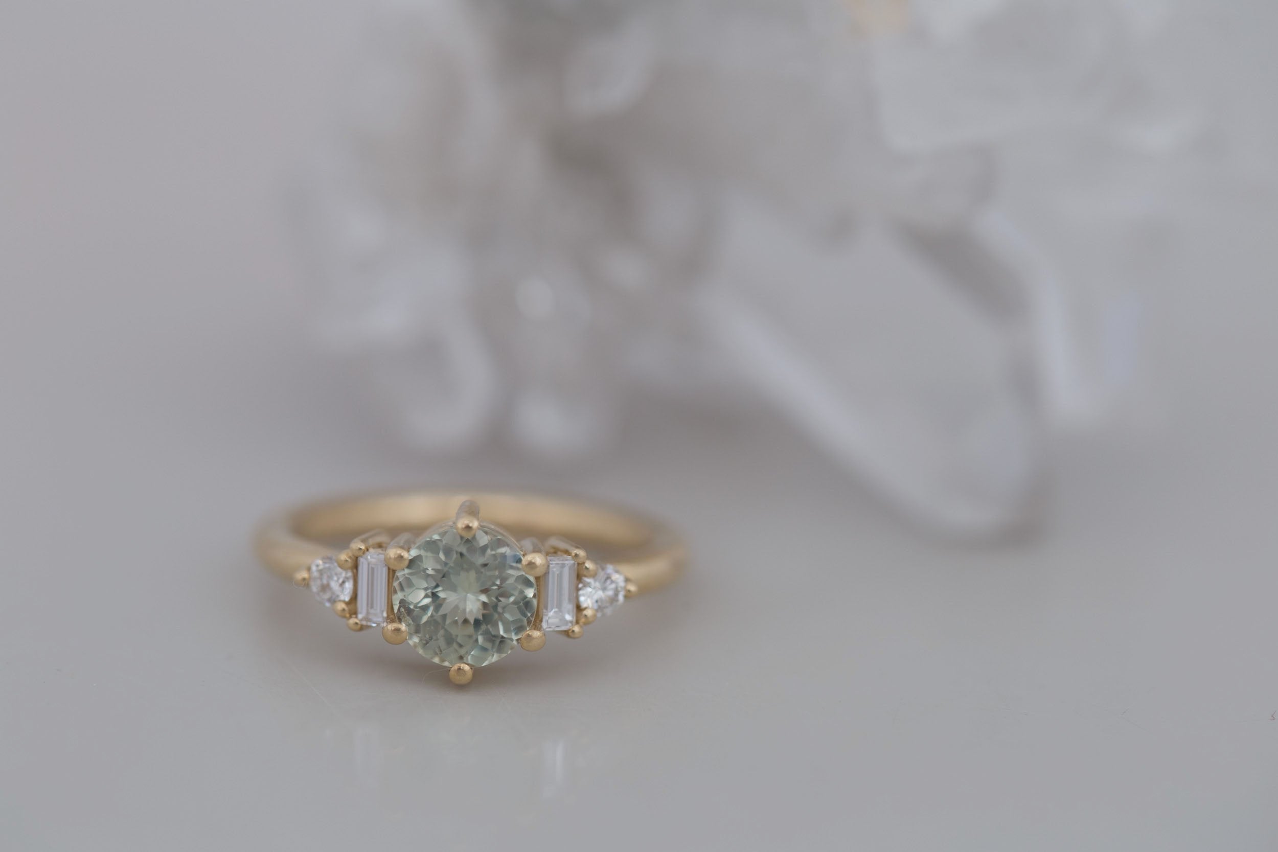 Alsea Ring | Mint Round Sapphire + Baguette and Round Diamond Accent Engagement Ring 1.29 ct | 14k Recycled Yellow Gold | One of a Kind