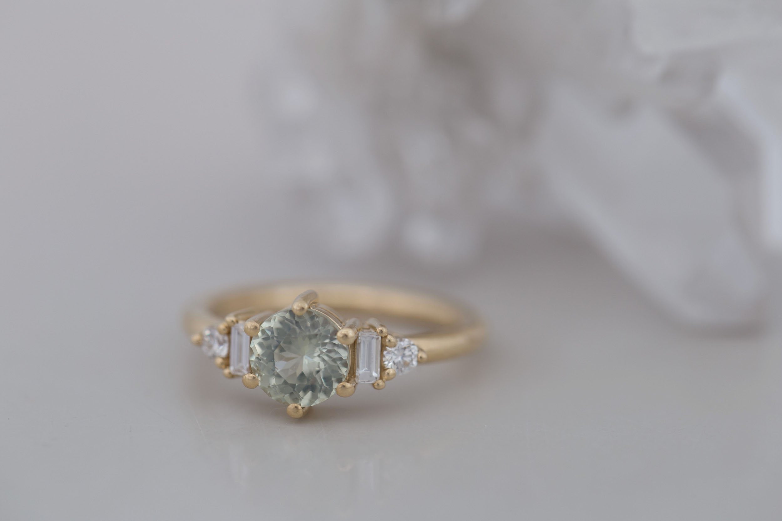 Alsea Ring | Mint Round Sapphire + Baguette and Round Diamond Accent Engagement Ring 1.29 ct | 14k Recycled Yellow Gold | One of a Kind