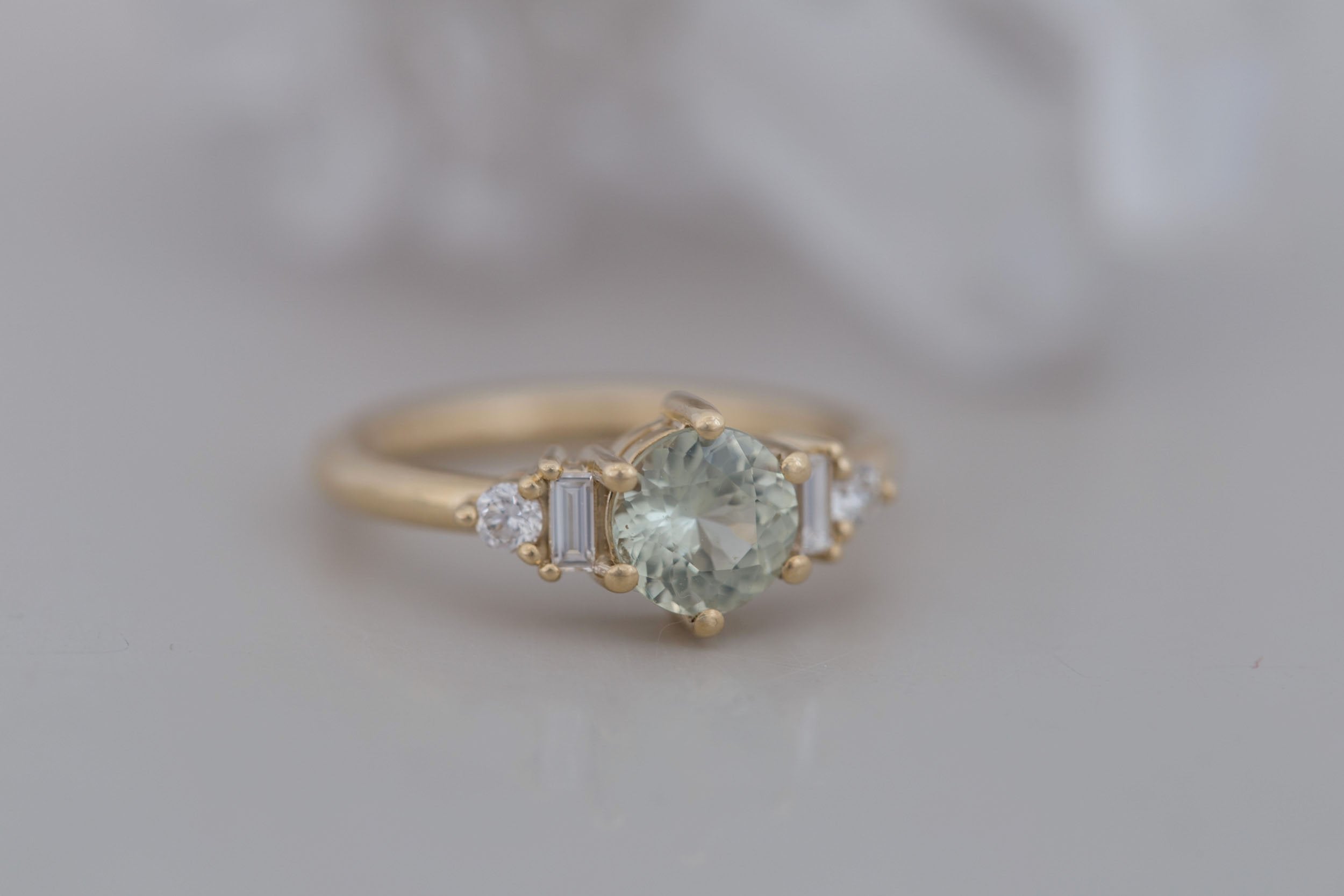 Alsea Ring | Mint Round Sapphire + Baguette and Round Diamond Accent Engagement Ring 1.29 ct | 14k Recycled Yellow Gold | One of a Kind