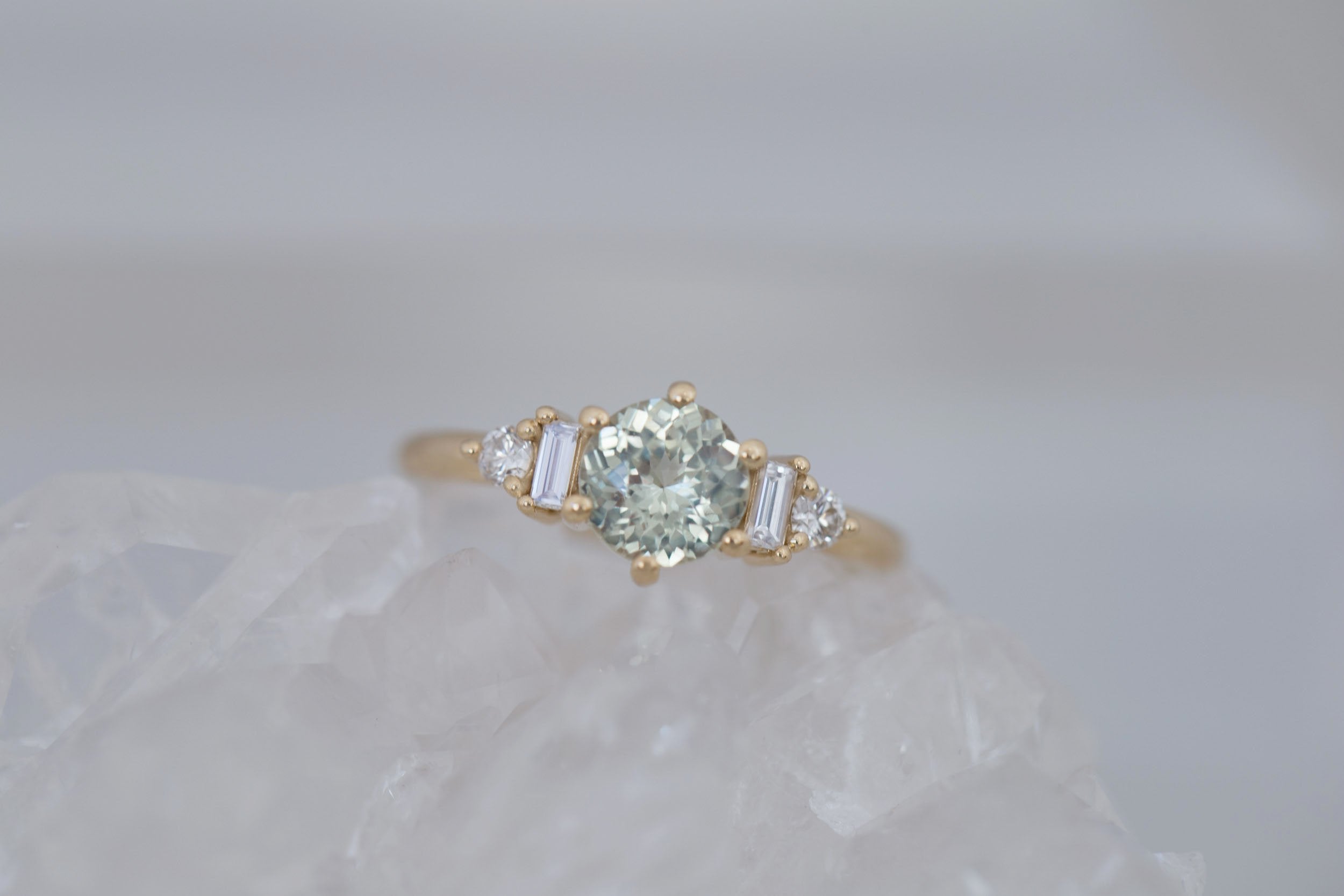 Alsea Ring | Mint Round Sapphire + Baguette and Round Diamond Accent Engagement Ring 1.29 ct | 14k Recycled Yellow Gold | One of a Kind
