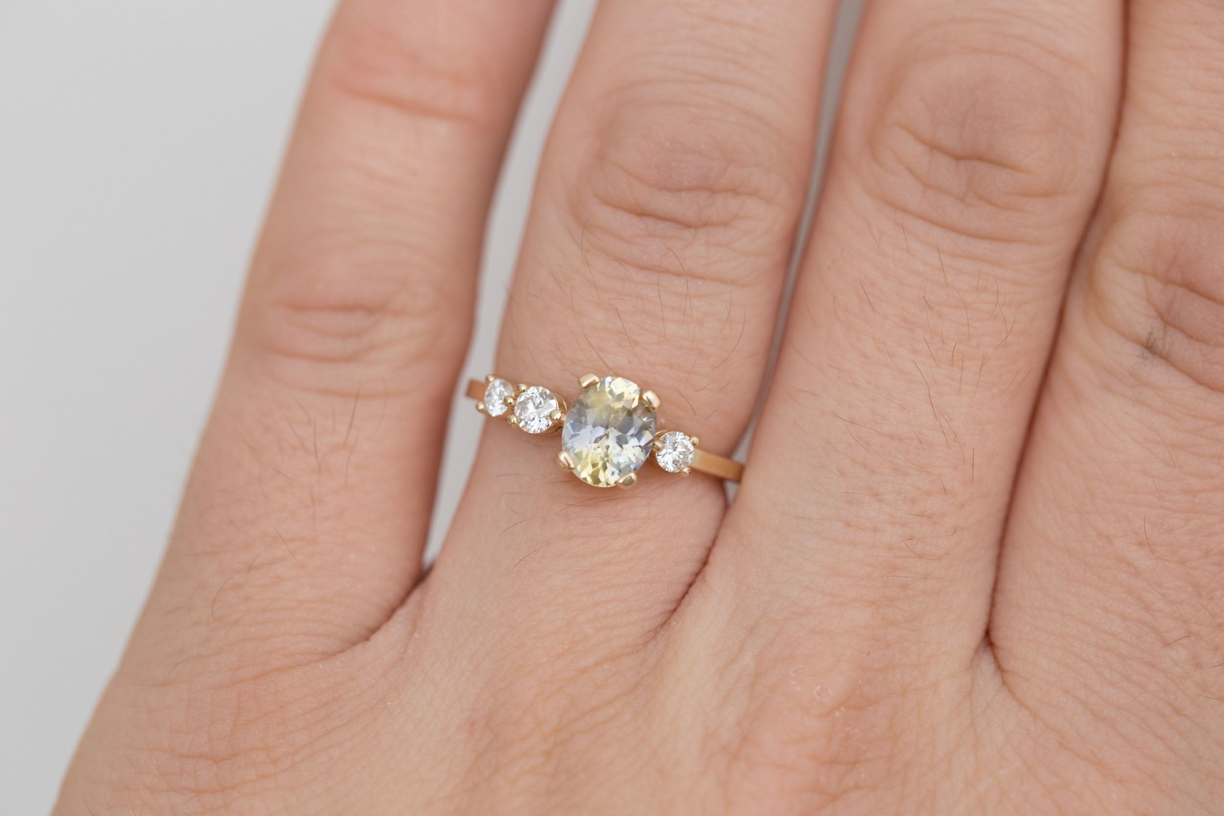 Cassia Ring | Bicolor Oval Sapphire + Diamond Asymmetrical Engagement Ring 1.32 ct | 14k Recycled Gold | One of a Kind