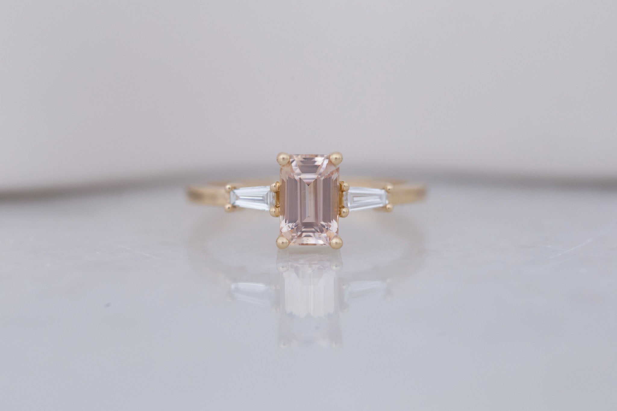 Marlowe Ring | Peach Emerald Cut Sapphire + Tapered Baguette Engagement Ring 1.34 ct | 14k Recycled Gold | One of a Kind