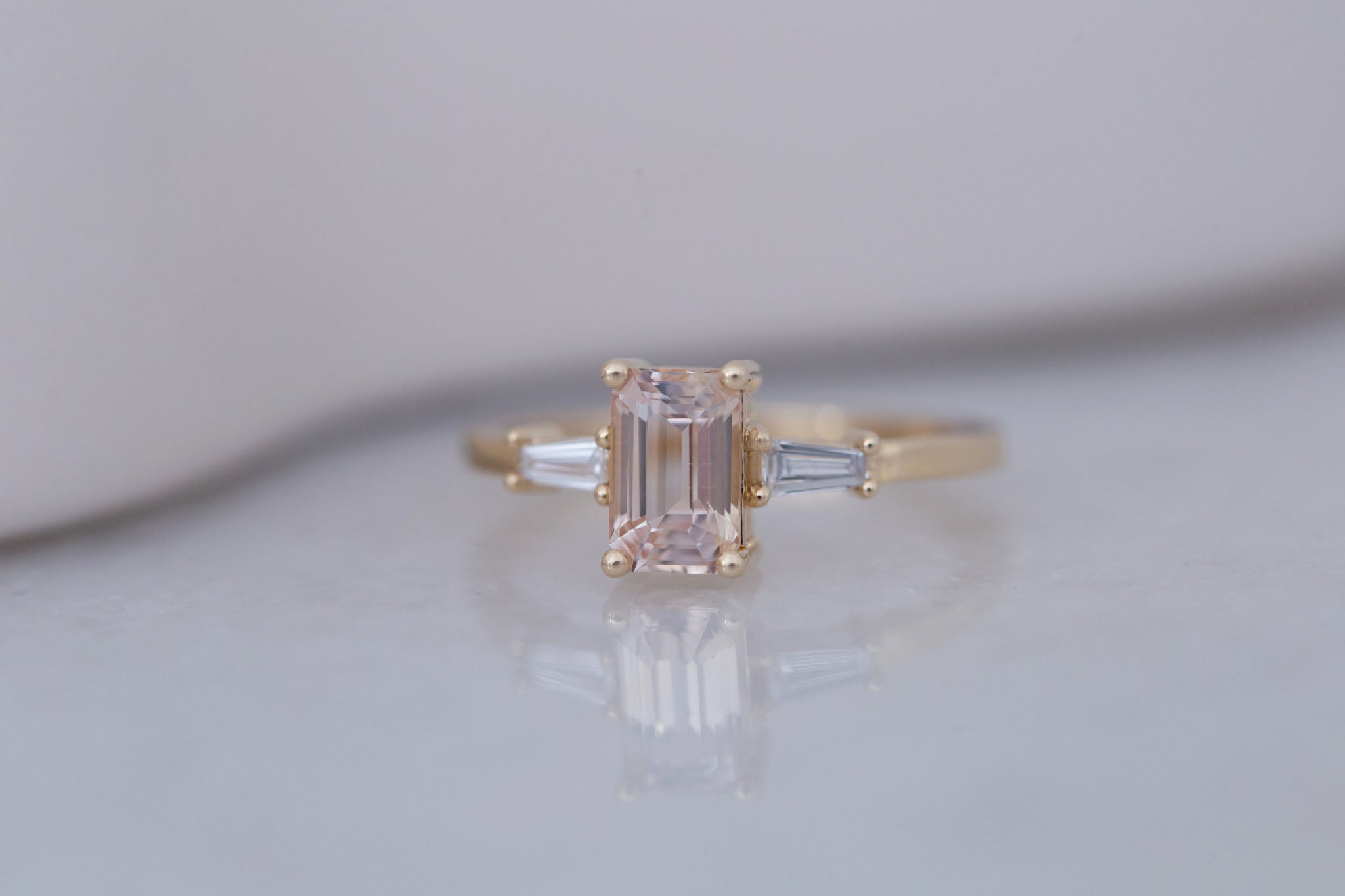 Marlowe Ring | Peach Emerald Cut Sapphire + Tapered Baguette Engagement Ring 1.34 ct | 14k Recycled Gold | One of a Kind