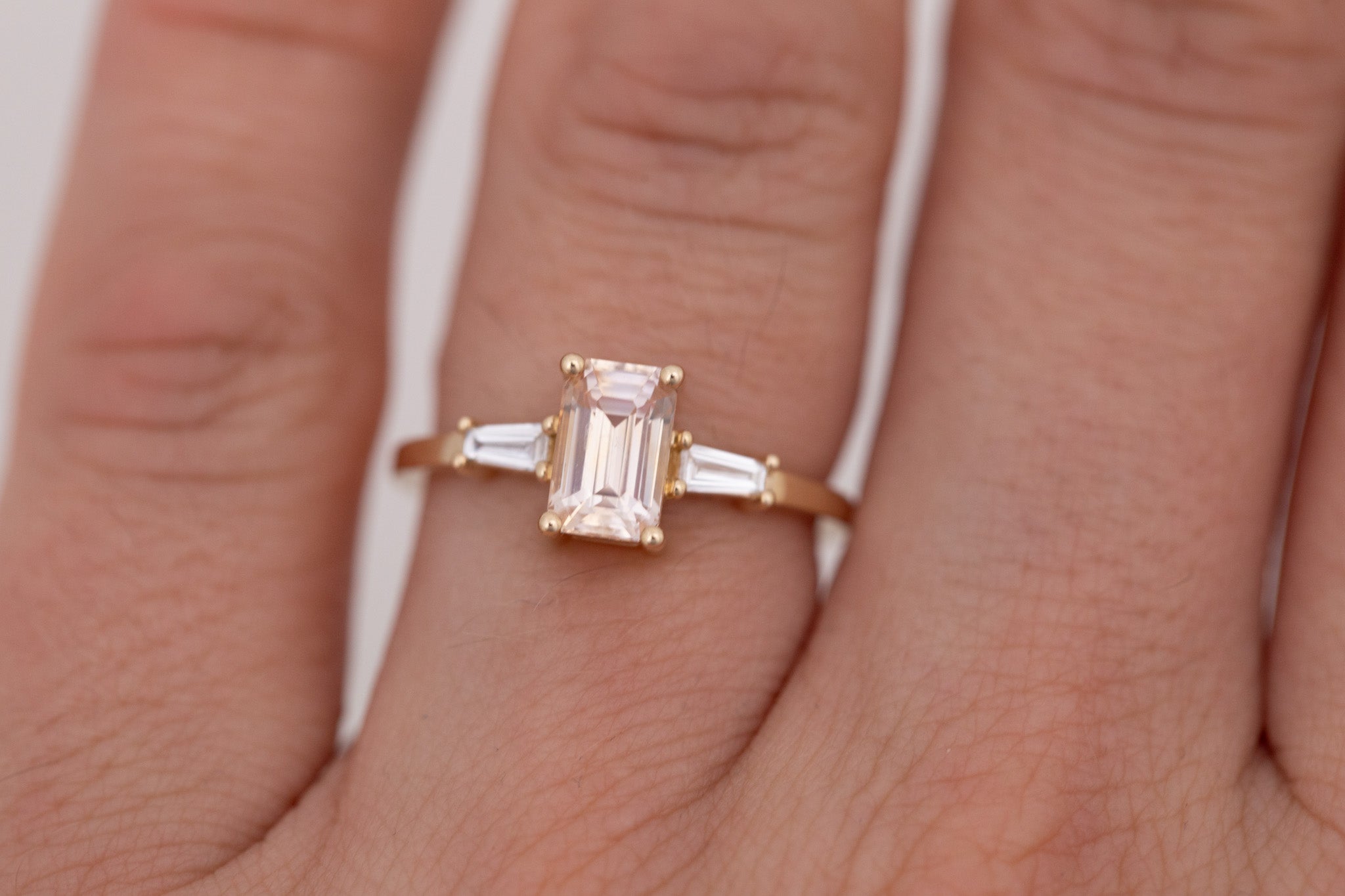 Marlowe Ring | Peach Emerald Cut Sapphire + Tapered Baguette Engagement Ring 1.34 ct | 14k Recycled Gold | One of a Kind